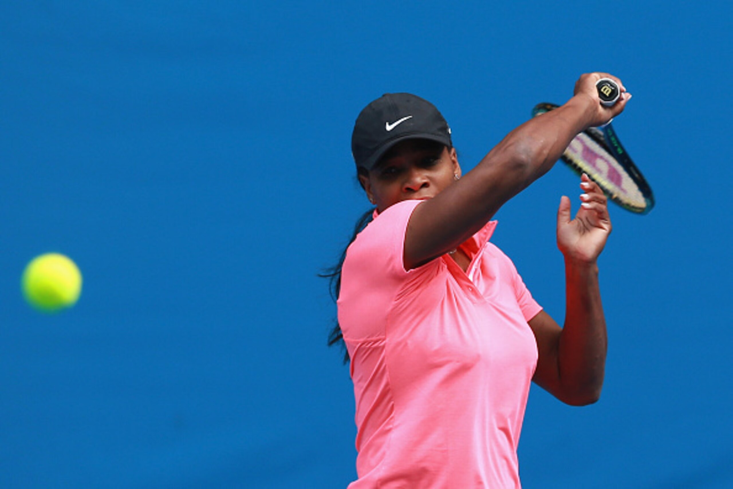 MELBOURNE, AUSTRALIA - JANUARY 18:  Serena Williams of the USA hits a forehand during a practice session ahead of the 2015 Australian Open at Melbourne Park on January 18, 2015 in Melbourne, Australia.  (Photo by Quinn Rooney/Getty Images)
