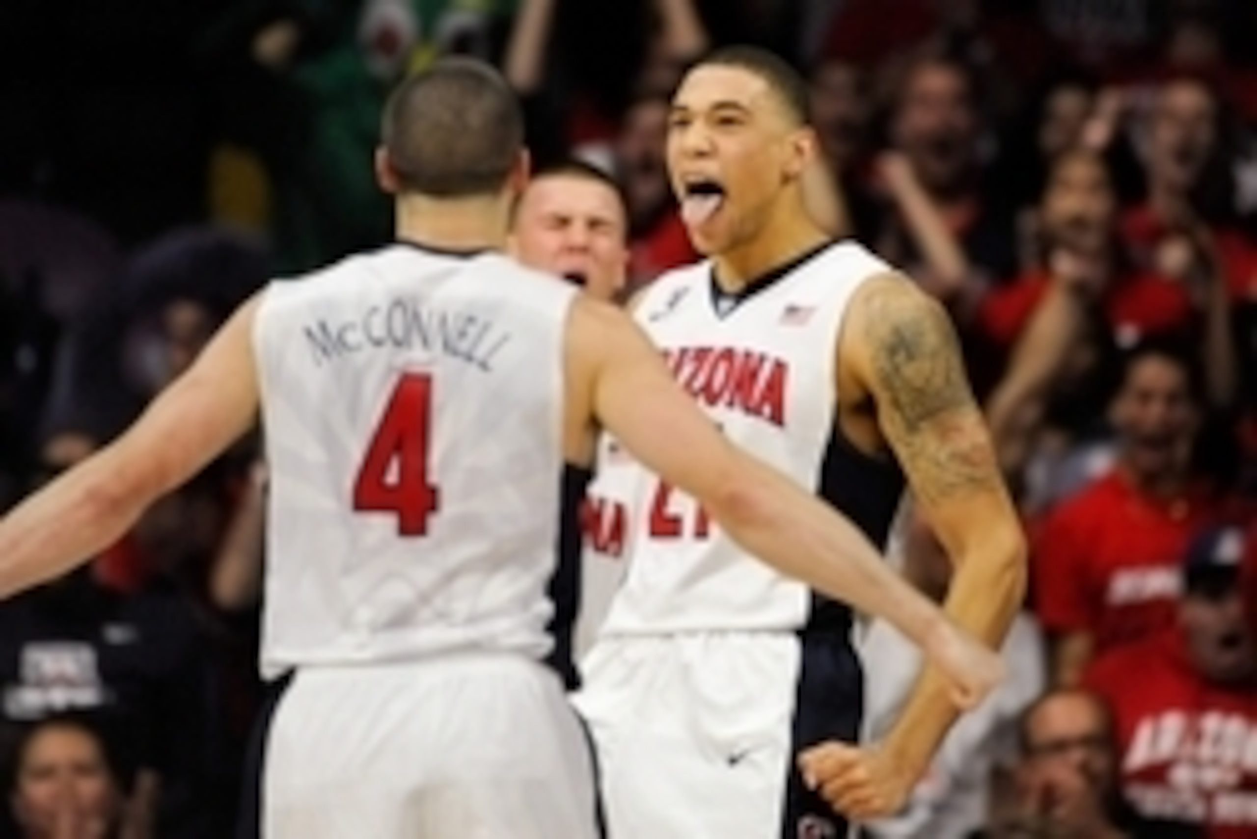 Jan 17, 2015; Tucson, AZ, USA; Arizona Wildcats forward Brandon Ashley (21) celebrates after making a shot against the Utah Utes during the first half at McKale Center. Mandatory Credit: Casey Sapio-USA TODAY Sports
