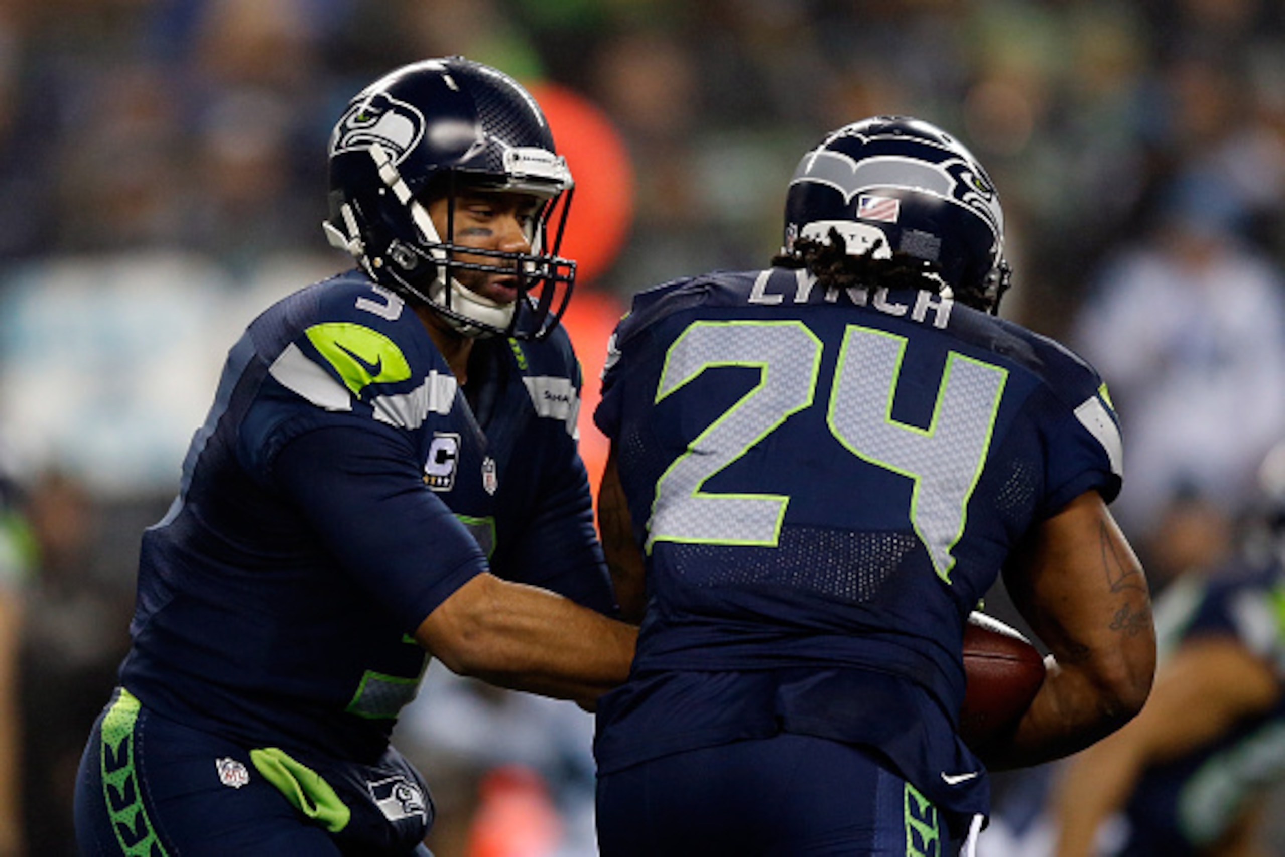 SEATTLE, WA - JANUARY 10:  Marshawn Lynch #24 of the Seattle Seahawks in action against the Carolina Panthers during the 2015 NFC Divisional Playoff game at CenturyLink Field on January 10, 2015 in Seattle, Washington.  (Photo by Otto Greule Jr/Getty Imag