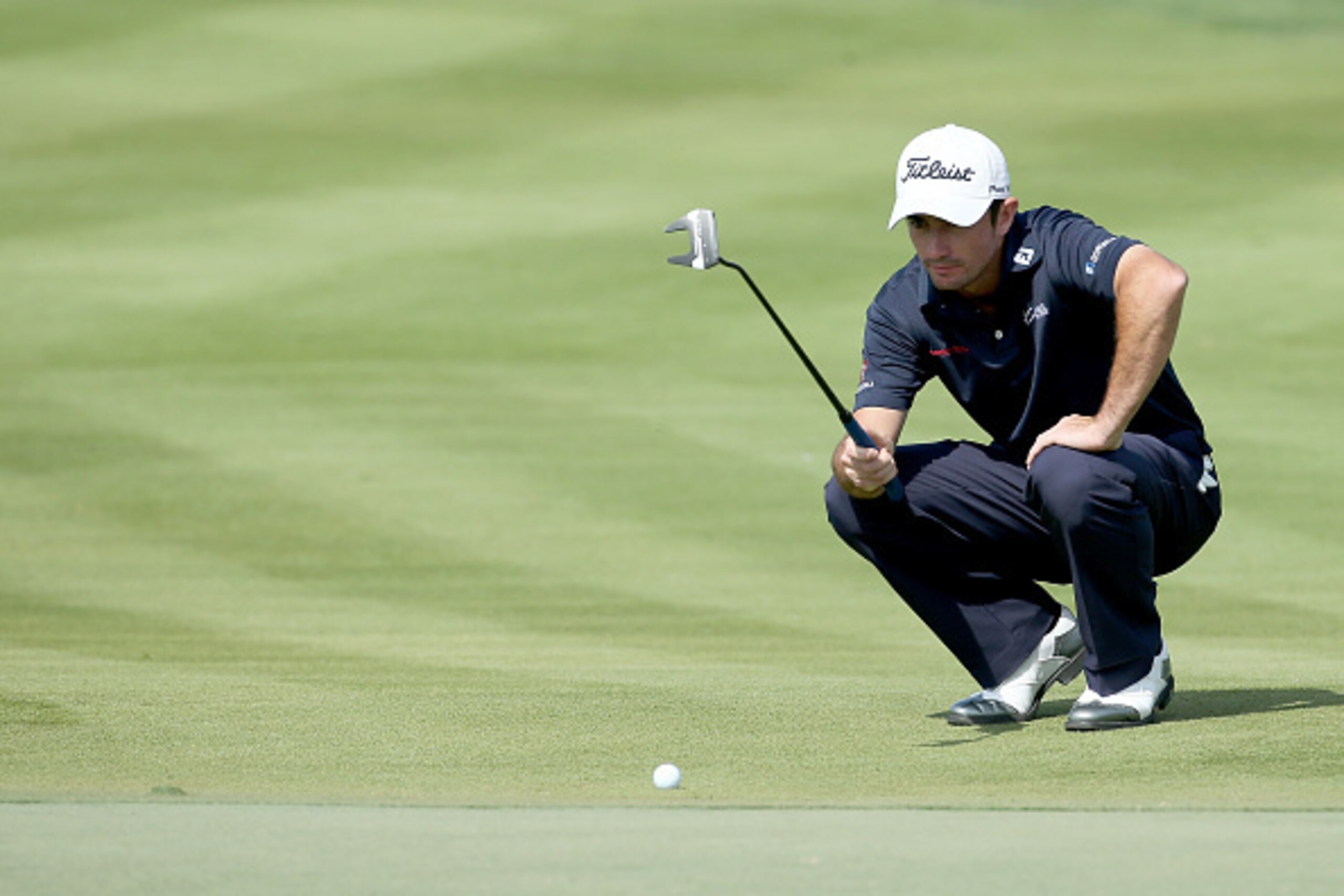 ABU DHABI, UNITED ARAB EMIRATES - JANUARY 18:  Gary Stal of France putting at the par 5, second hole during the final round of the Abu Dhabi HSBC Golf Championship at Abu Dhabi Golf Club on January 18, 2015 in Abu Dhabi, United Arab Emirates.  (Photo by D