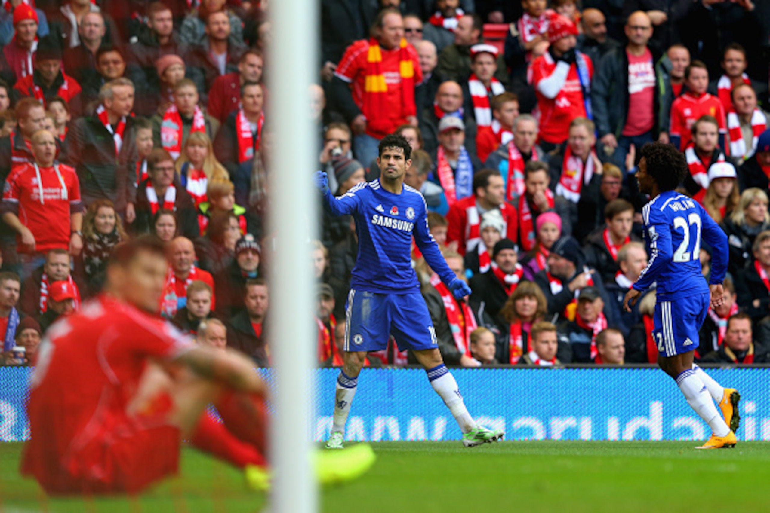 LIVERPOOL, ENGLAND - NOVEMBER 08:  Diego Costa of Chelsea celebrates scoring their second goal during the Barclays Premier League match between Liverpool and Chelsea at Anfield on November 8, 2014 in Liverpool, England.  (Photo by Alex Livesey/Getty Image