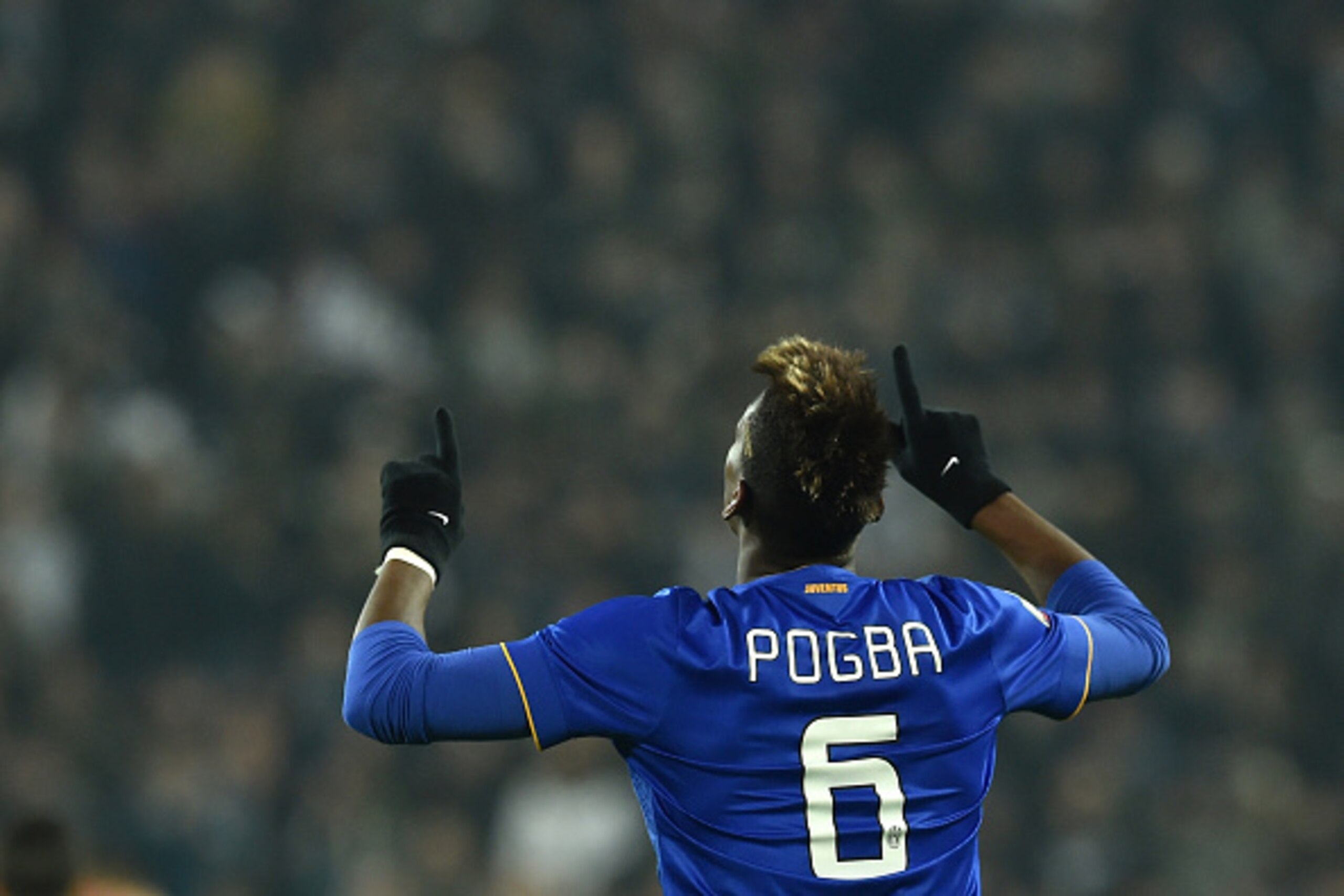 TURIN, ITALY - JANUARY 15:  Paul Pogba of Juventus FC celebrates a goal during the TIM Cup match between Juventus FC and Hellas Verona FC at Juventus Arena on January 15, 2015 in Turin, Italy.  (Photo by Valerio Pennicino/Getty Images)