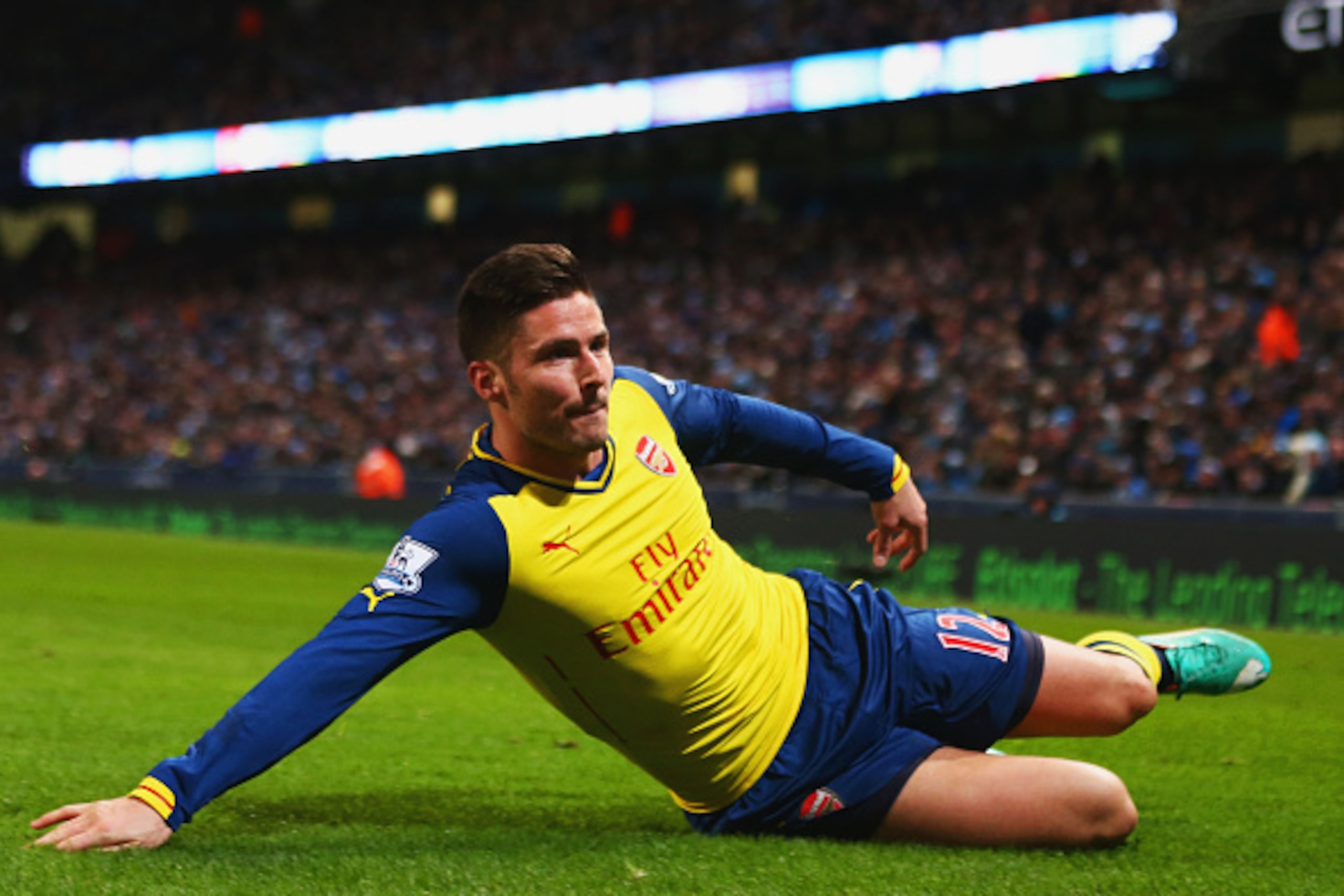 MANCHESTER, ENGLAND - JANUARY 18:  Olivier Giroud of Arsenal (12) celebrates as he scores their second goal during the Barclays Premier League match between Manchester City and Arsenal at Etihad Stadium on January 18, 2015 in Manchester, England.  (Photo 