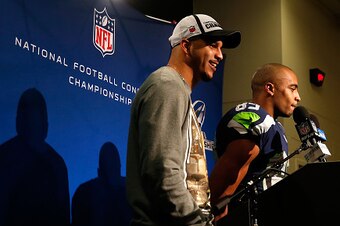 SEATTLE, WA - JANUARY 18:  Jermaine Kearse #15 (L) and Doug Baldwin #89 of the Seattle Seahawks speak to the media after defeating the Green Bay Packers 28-22 in the 2015 NFC Championship game at CenturyLink Field on January 18, 2015 in Seattle, Washingto