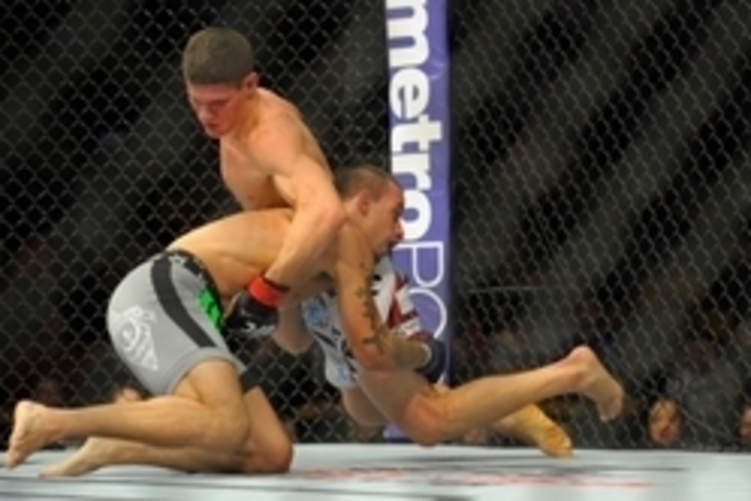 Jan 18, 2015; Boston, MA, USA; Charles Rosa (red) and Sean Soriano (blue) compete during a featherweight bout at UFC Fight Night at TD Garden. Mandatory Credit: Bob DeChiara-USA TODAY Sports