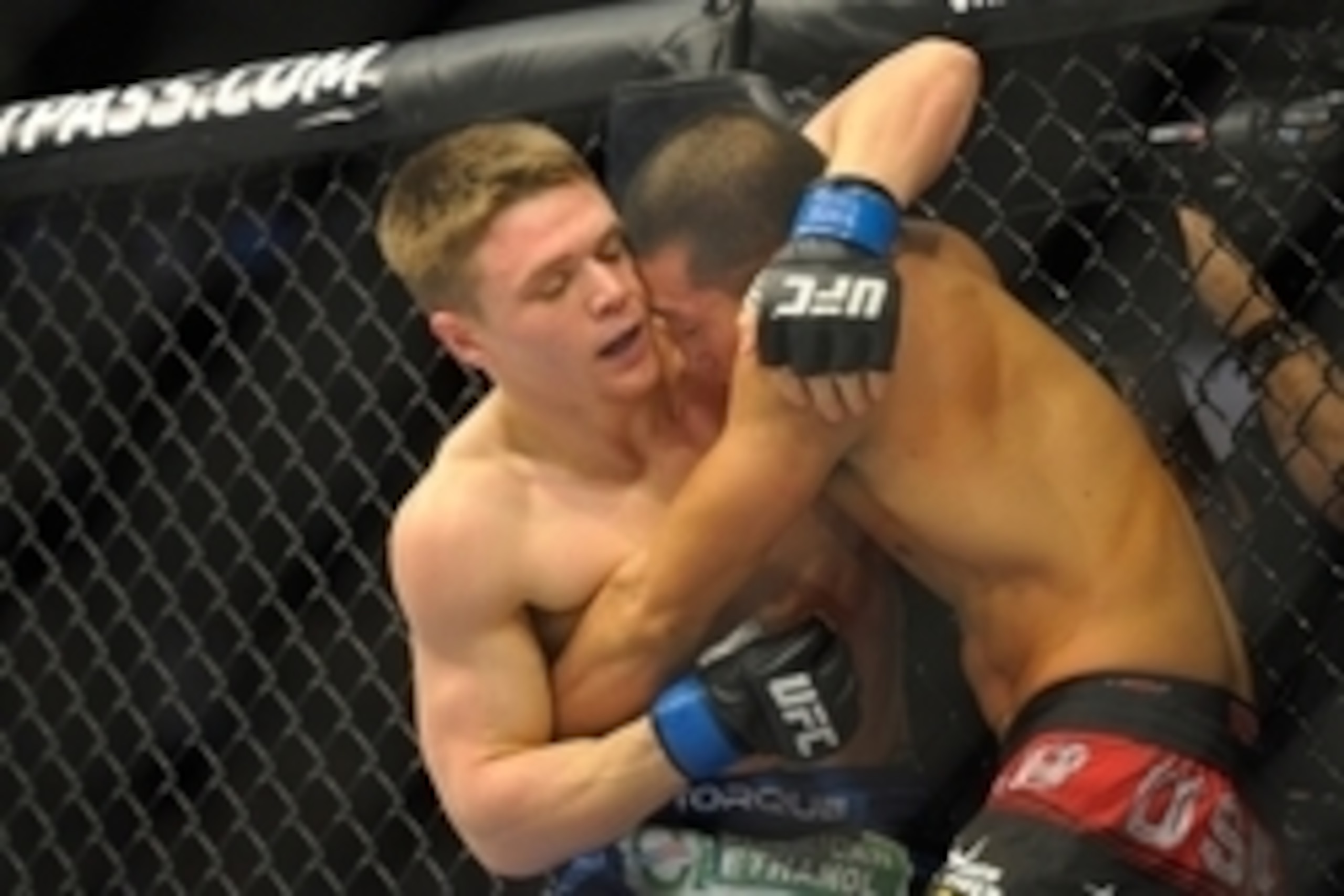 Jan 18, 2015; Boston, MA, USA; Zhang Lipeng (red) and Chris Wade (blue) compete during a lightweight bout at UFC Fight Night at TD Garden. Mandatory Credit: Bob DeChiara-USA TODAY Sports