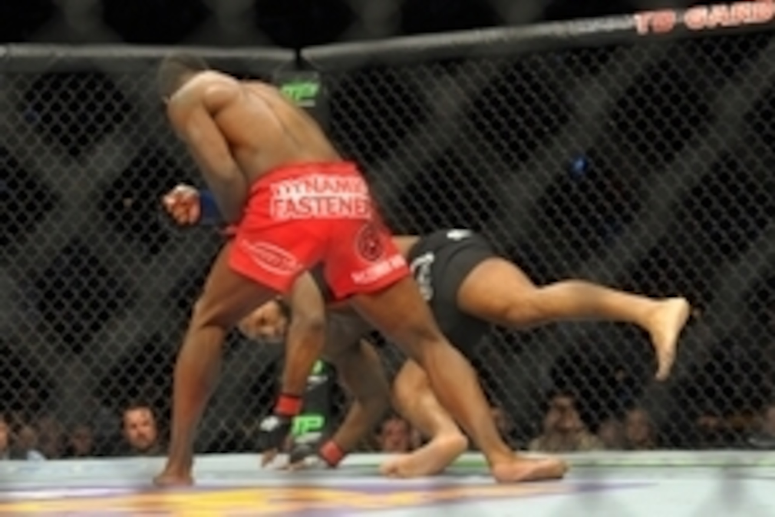 Jan 18, 2015; Boston, MA, USA; John Howard (red) and Lorenz Larkin (blue) compete during a welterweight bout at UFC Fight Night at TD Garden. Mandatory Credit: Bob DeChiara-USA TODAY Sports