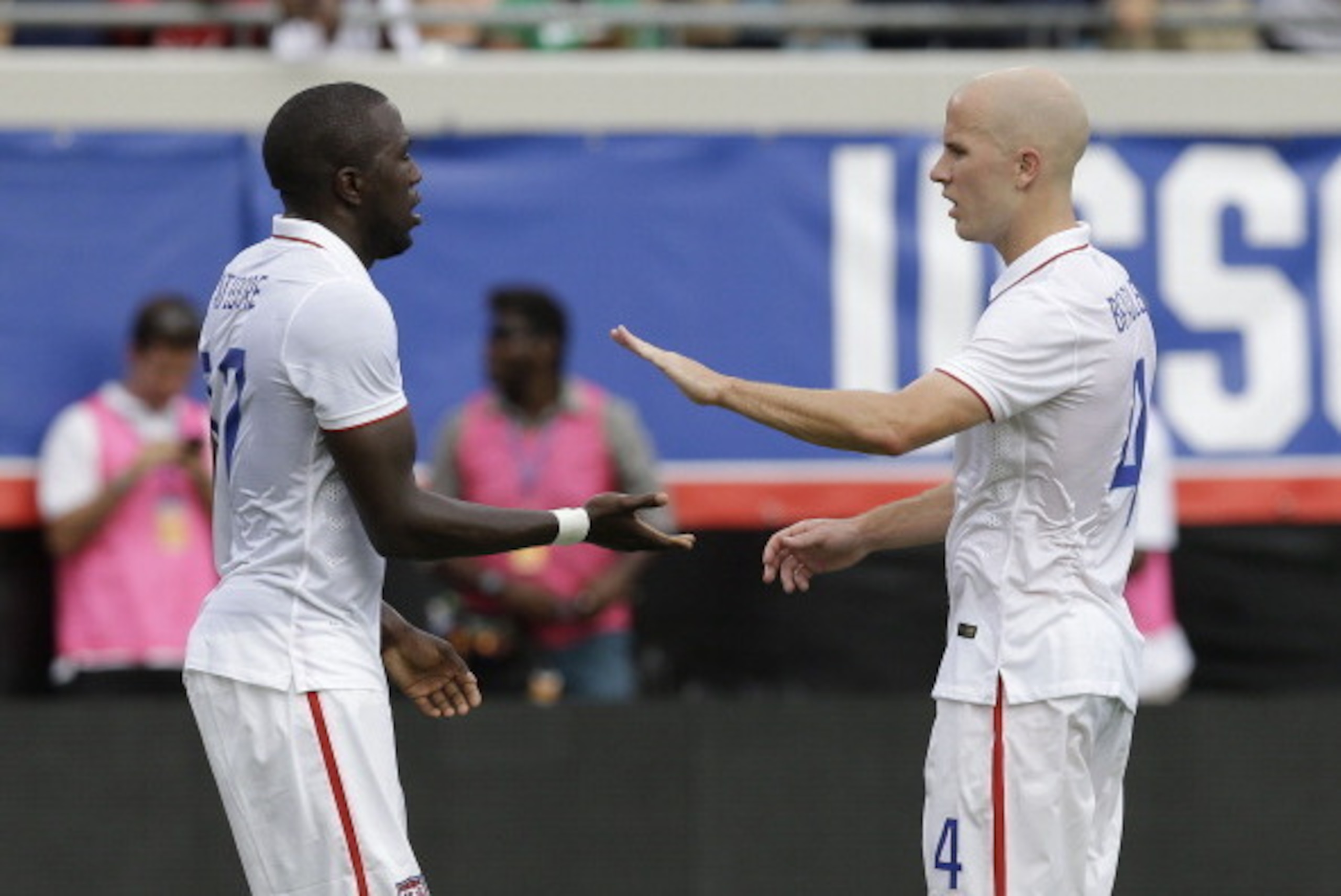 JACKSONVILLE, FL - JUNE 07: Midfielder Michael Bradley #4 of the United States congratulates forward Jozy Altidore #17 after Altidore's first half goal during the international friendly match against Nigeria at EverBank Field on June 7, 2014 in Jacksonvil