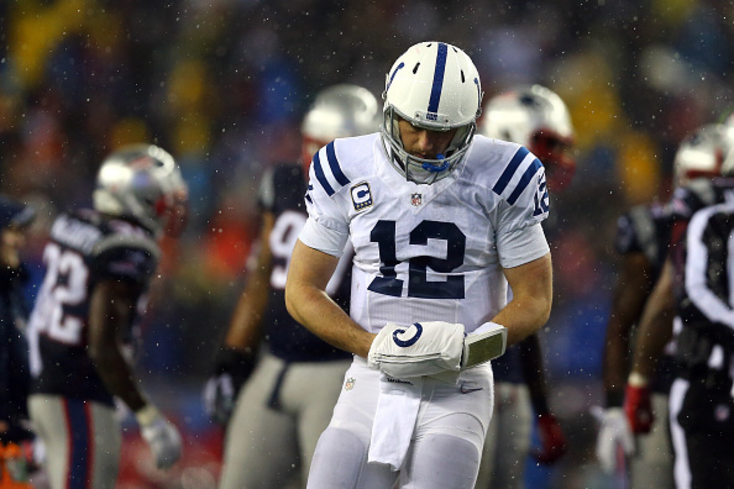 FOXBORO, MA - JANUARY 18:  Andrew Luck #12 of the Indianapolis Colts reacts in the fourth quarter against the New England Patriots in the 2015 AFC Championship Game at Gillette Stadium on January 18, 2015 in Foxboro, Massachusetts.  (Photo by Maddie Meyer
