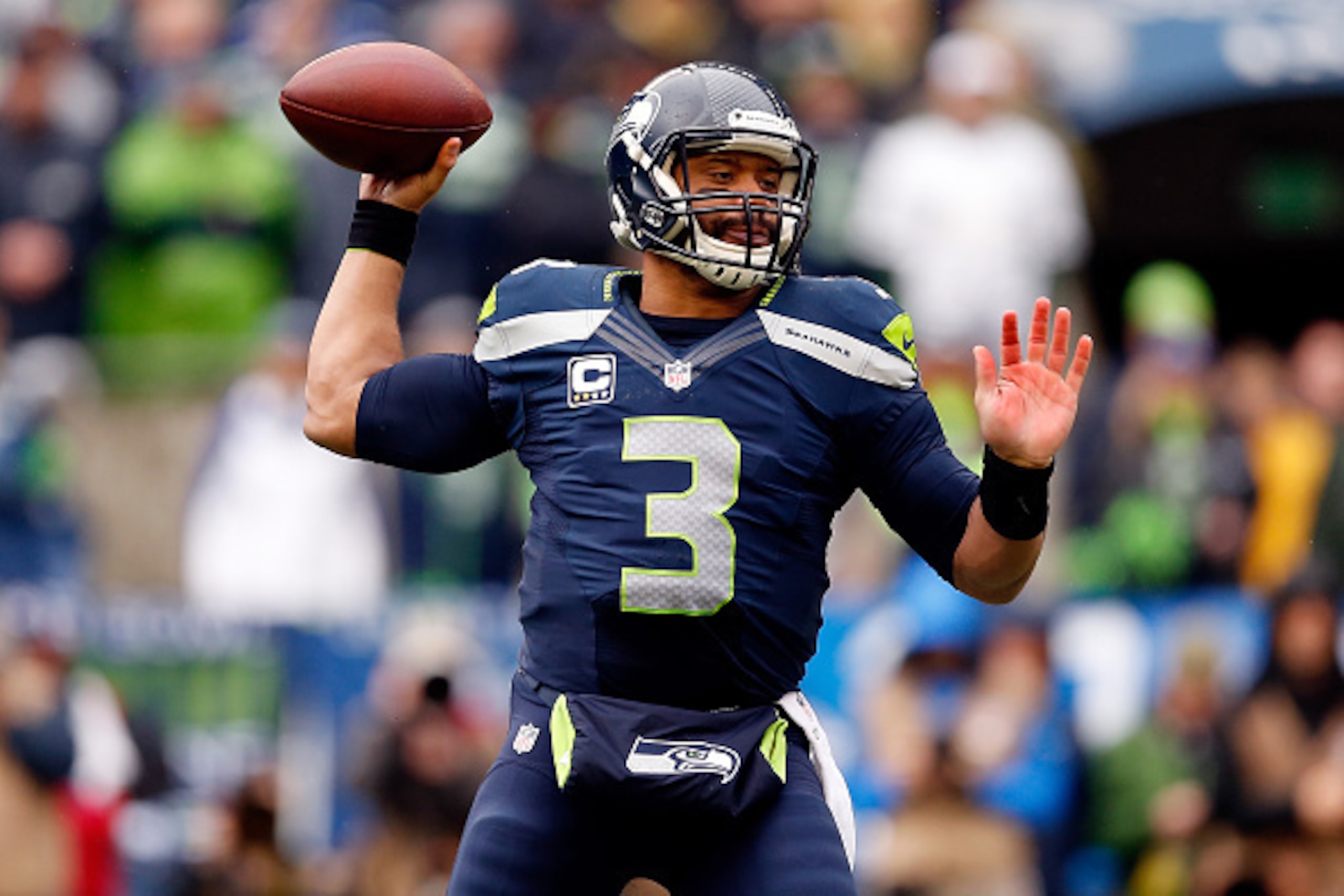 SEATTLE, WA - JANUARY 18: Russell Wilson #3 of the Seattle Seahawks passes the ball during the first quarter of the 2015 NFC Championship game against the Green Bay Packers at CenturyLink Field on January 18, 2015 in Seattle, Washington. (Photo by Christ SEATTLE, WA - JANUARY 18: Russell Wilson #3 of the Seattle Seahawks passes the ball during the first quarter of the 2015 NFC Championship game against the Green Bay Packers at CenturyLink Field on January 18, 2015 in Seattle, Washington. (Photo by Christ