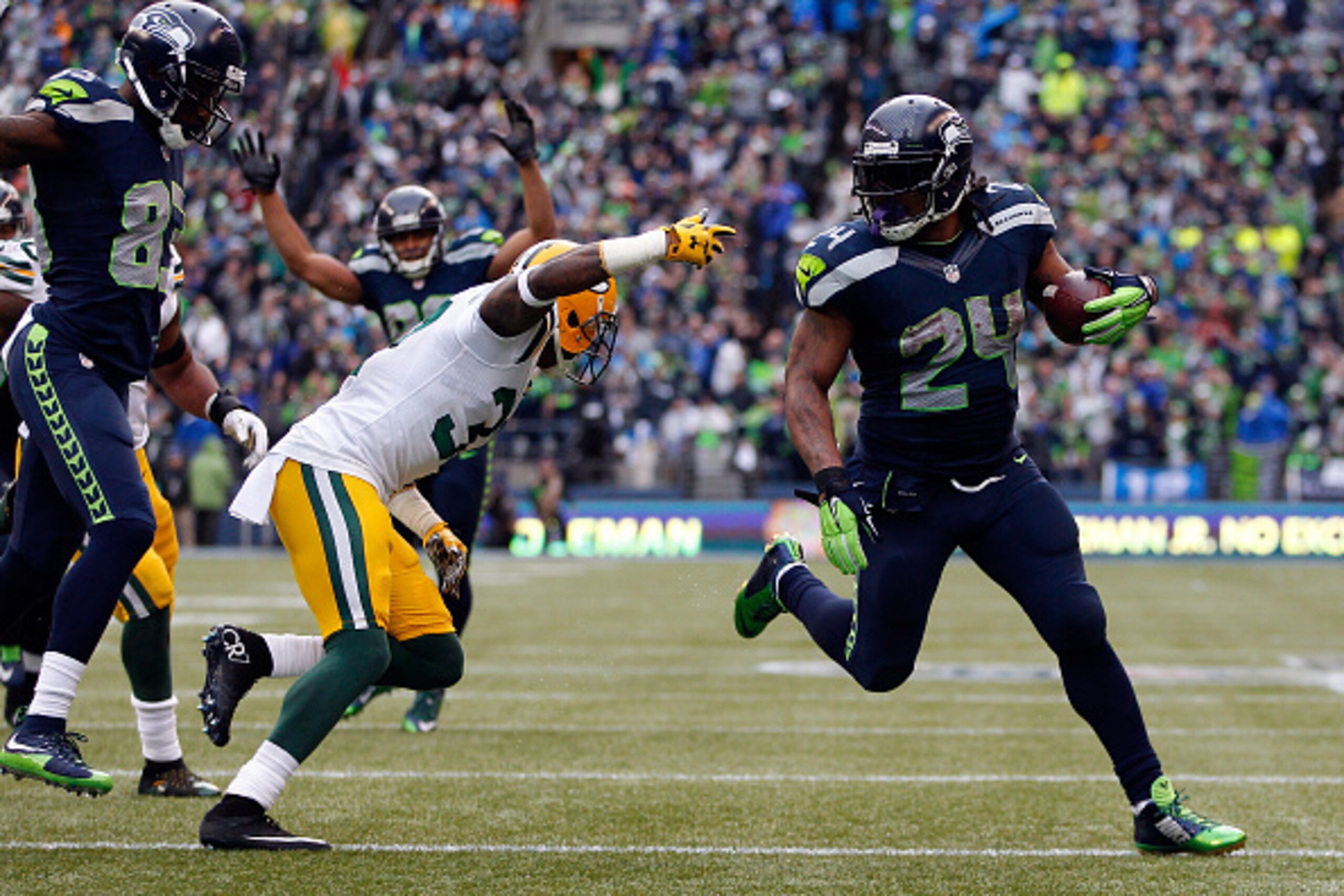 SEATTLE, WA - JANUARY 18: Marshawn Lynch #24 of the Seattle Seahawks runs the ball in for a touchdown during the fourth quarter of the 2015 NFC Championship game against the Green Bay Packers at CenturyLink Field on January 18, 2015 in Seattle, Washingto SEATTLE, WA - JANUARY 18: Marshawn Lynch #24 of the Seattle Seahawks runs the ball in for a touchdown during the fourth quarter of the 2015 NFC Championship game against the Green Bay Packers at CenturyLink Field on January 18, 2015 in Seattle, Washingto