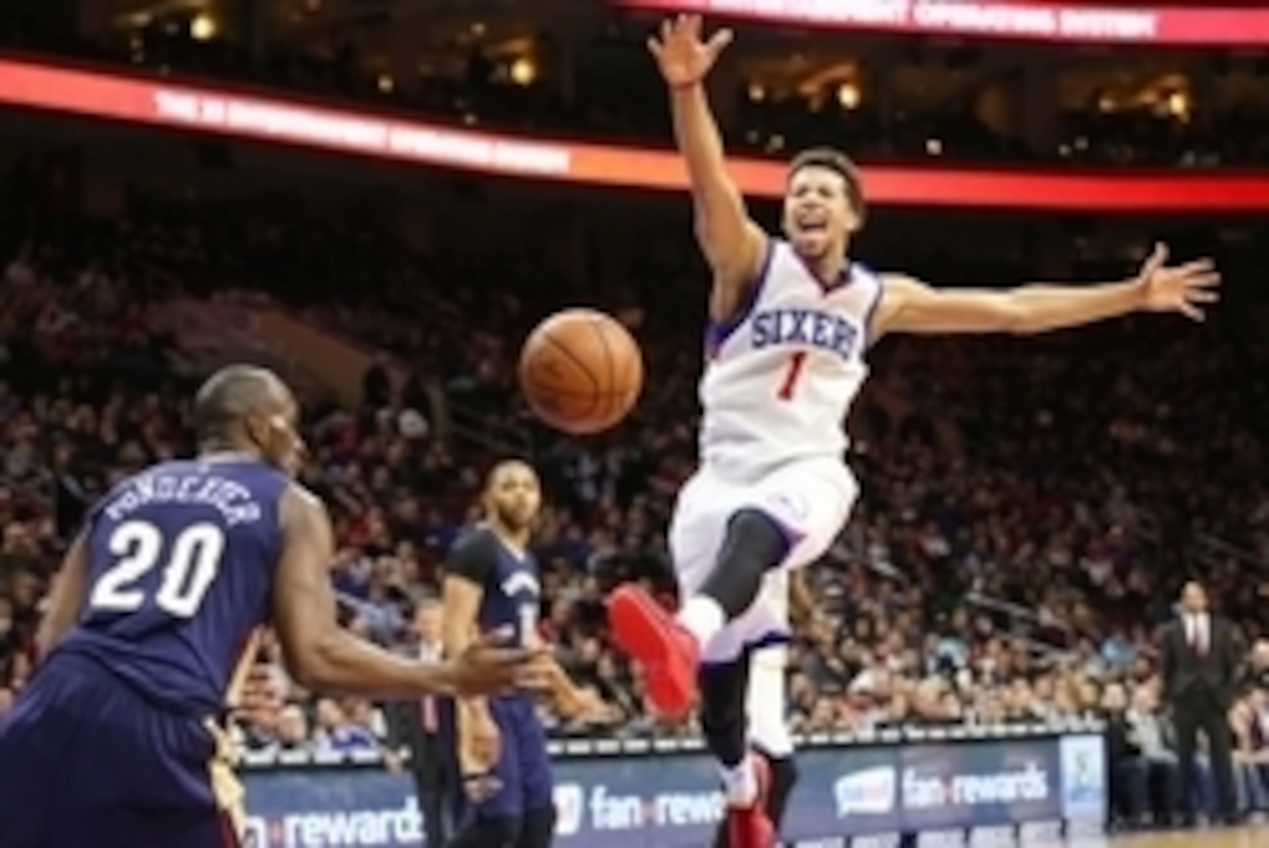 Jan 16, 2015; Philadelphia, PA, USA; Philadelphia 76ers guard Michael Carter-Williams (1) reacts after loosing control of the ball to New Orleans Pelicans guard Quincy Pondexter (20) during the second half at Wells Fargo Center. The 76ers defeated the Pel