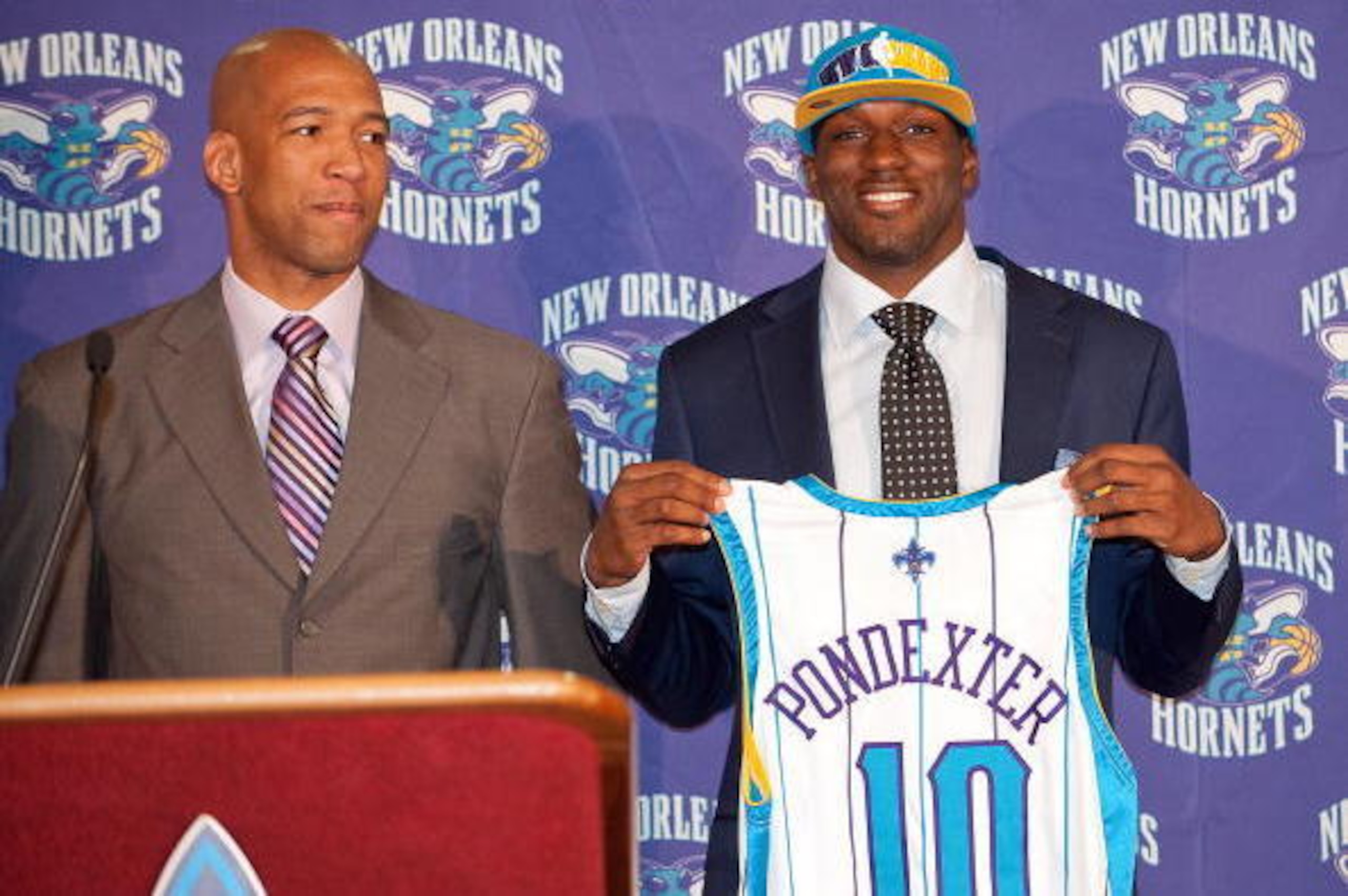 NEW ORLEANS - JULY 20: New Orleans Hornets 2010 draft pick Quincy Pondexter (R) is introduced by Head Coach Monty Williams (L) on July 20, 2010 at the University of New Orleans Human Performance Center in New Orleans, Louisiana. NOTE TO USER: User express