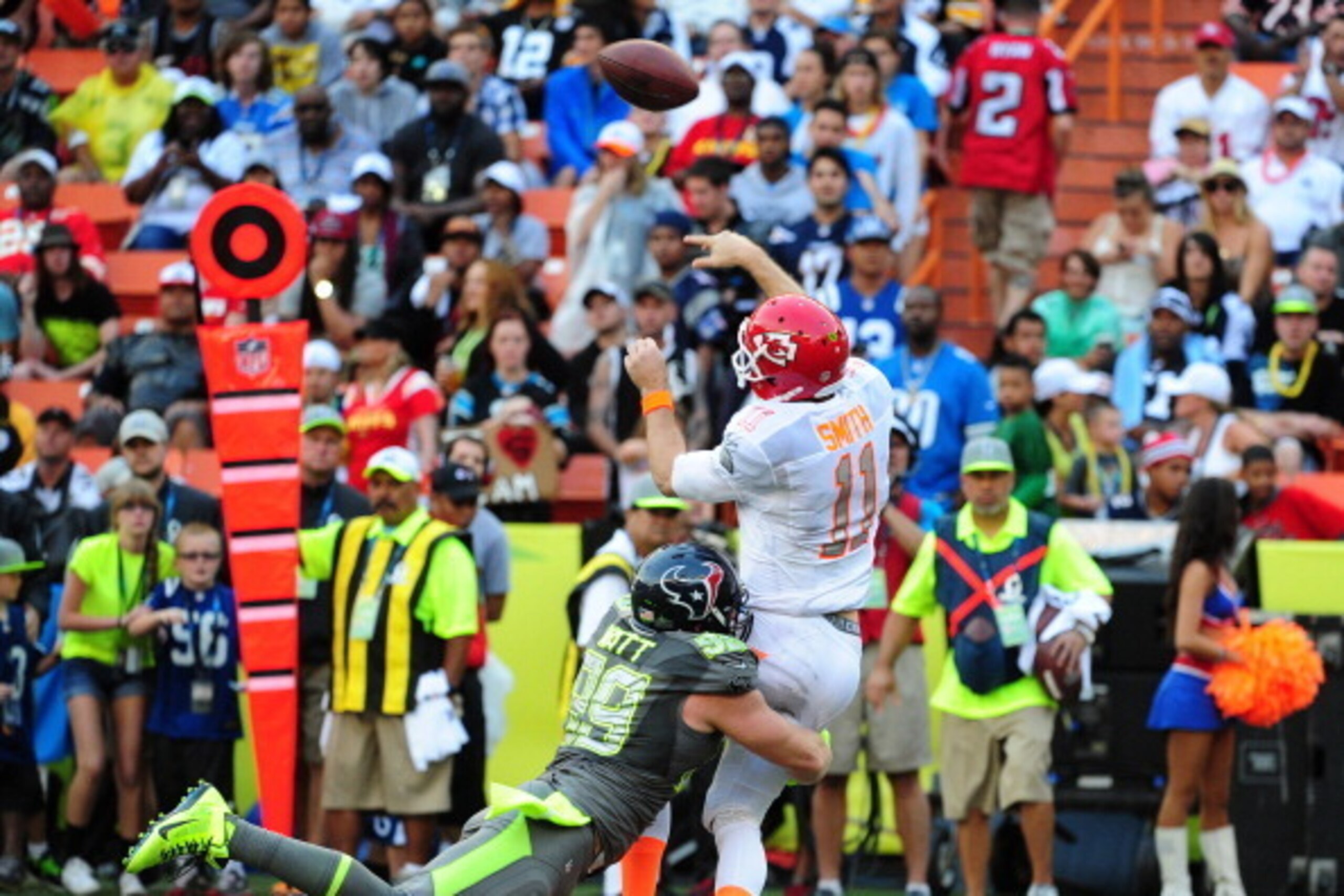 HONOLULU, HI - JANUARY 26: J. J.Watt #99 of the Houston Texans and Team Sanders pressures Alex Smith #11 of the Kansas City Chiefs and Team Rice during the 2014 Pro Bowl at Aloha Stadium on January 26, 2014 in Honolulu, Hawaii  (Photo by Scott Cunningham/