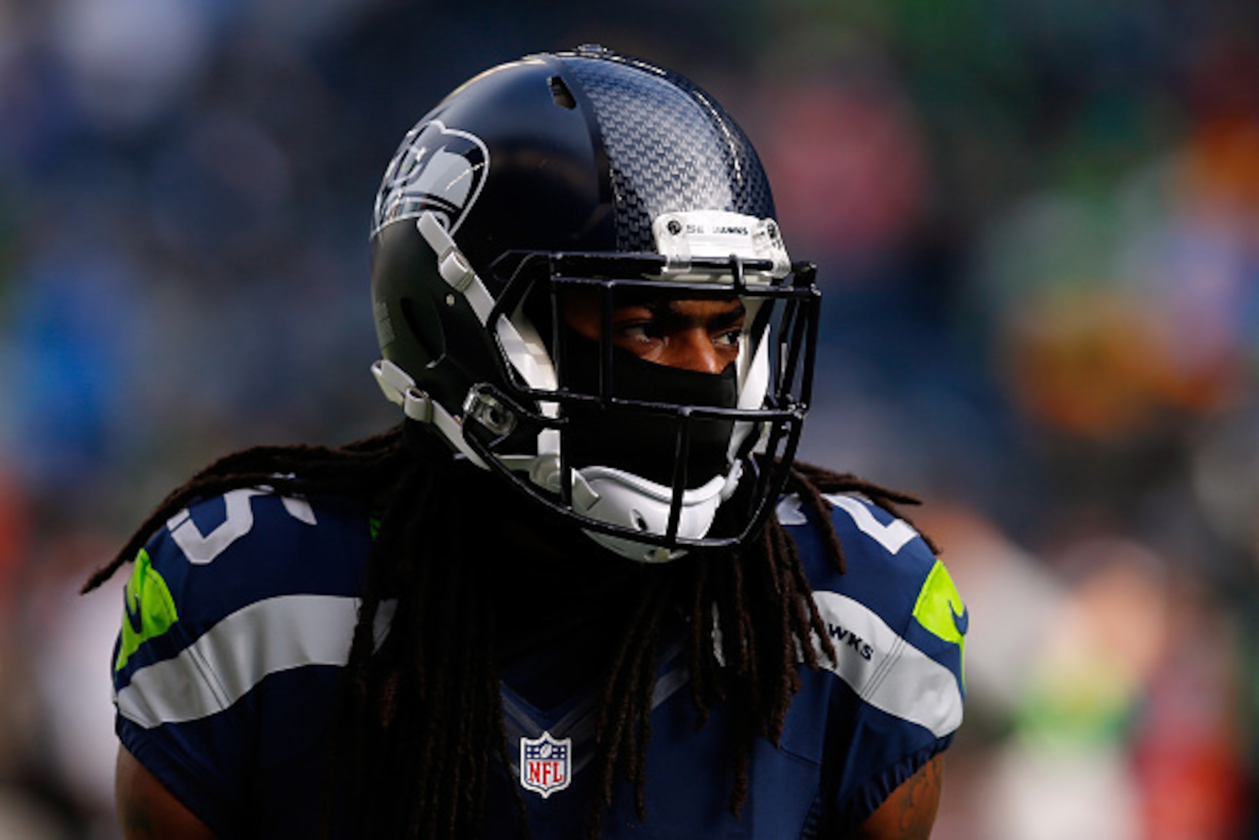 SEATTLE, WA - JANUARY 18:  Richard Sherman #25 of the Seattle Seahawks looks on before the 2015 NFC Championship game at CenturyLink Field on January 18, 2015 in Seattle, Washington.  (Photo by Tom Pennington/Getty Images)