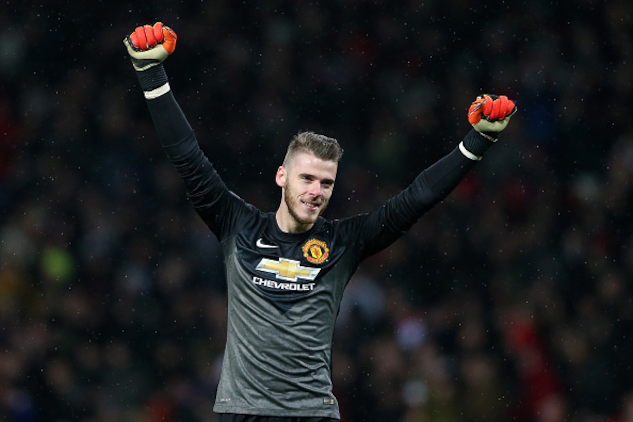 MANCHESTER, ENGLAND - DECEMBER 26:  David De Gea of Manchester United celebrates after the third goal during the Barclays Premier League match between Manchester United and Newcastle United at Old Trafford on December 26, 2014 in Manchester, England.  (Ph