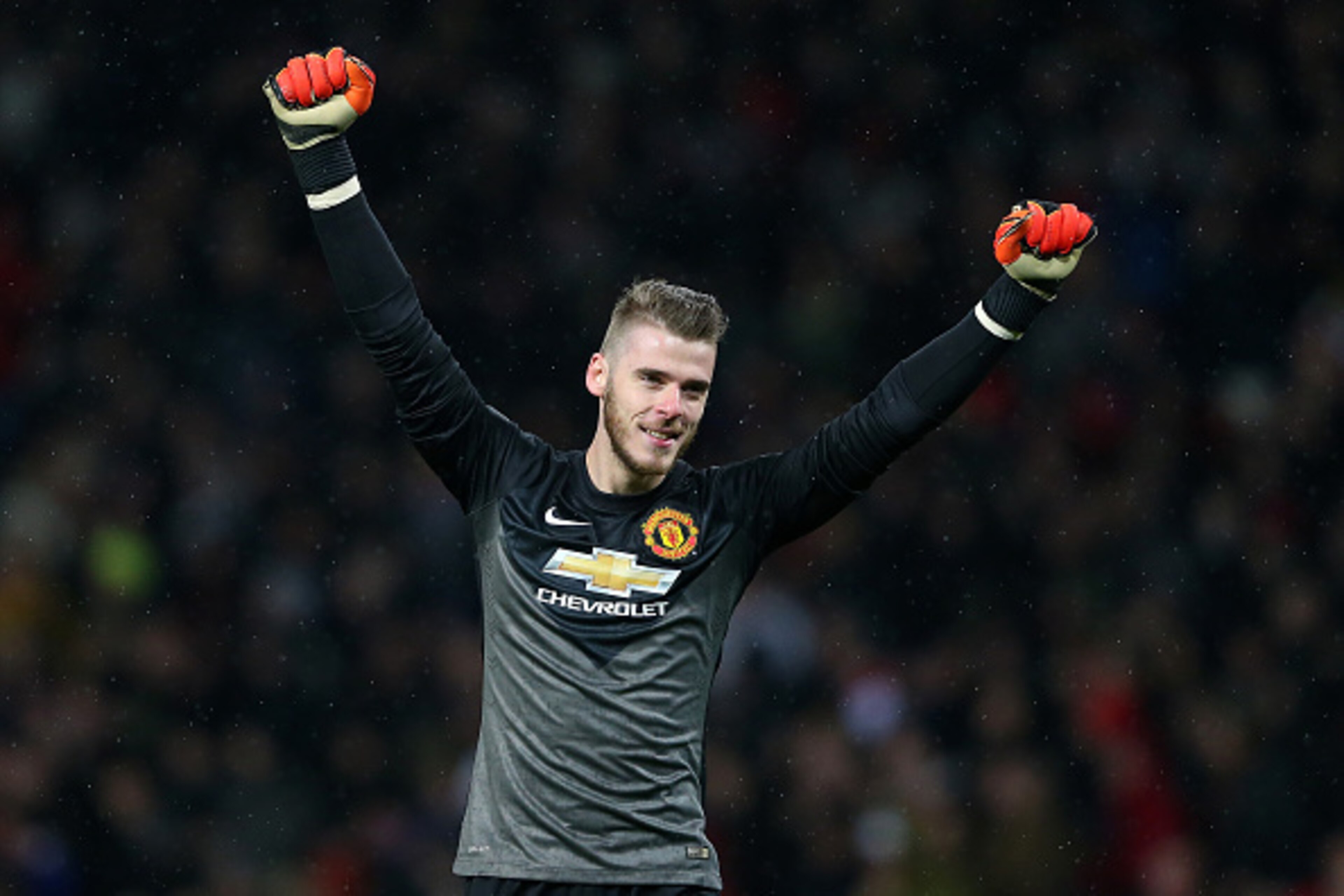 MANCHESTER, ENGLAND - DECEMBER 26:  David De Gea of Manchester United celebrates after the third goal during the Barclays Premier League match between Manchester United and Newcastle United at Old Trafford on December 26, 2014 in Manchester, England.  (Ph