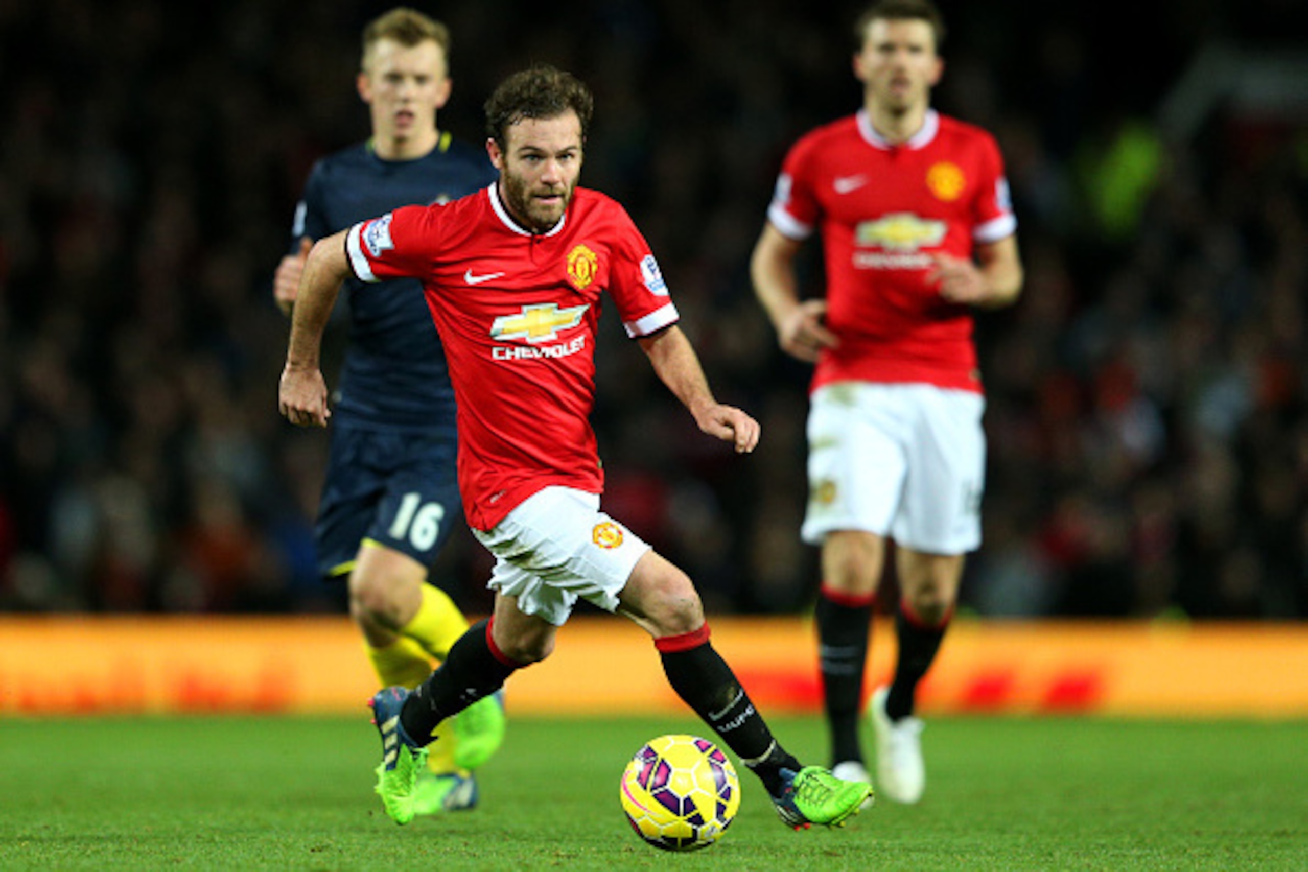 MANCHESTER, ENGLAND - JANUARY 11:  Juan Mata of Manchester United runs with the ball during the Barclays Premier League match between Manchester United and Southampton at Old Trafford on January 11, 2015 in Manchester, England.  (Photo by Clive Mason/Gett