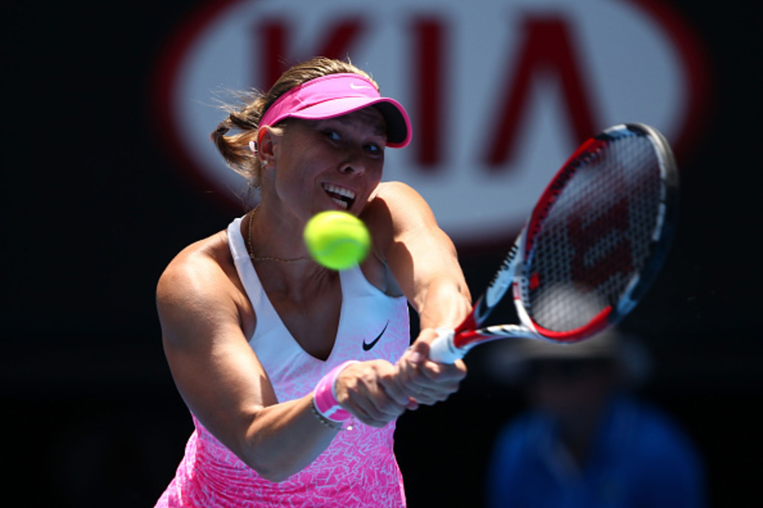 MELBOURNE, AUSTRALIA - JANUARY 19:  Lucie Hradecka of the Czech Republic plays a backhand in her first round match against Ana Ivanovic of Serbia during day one of the 2015 Australian Open at Melbourne Park on January 19, 2015 in Melbourne, Australia.  (P