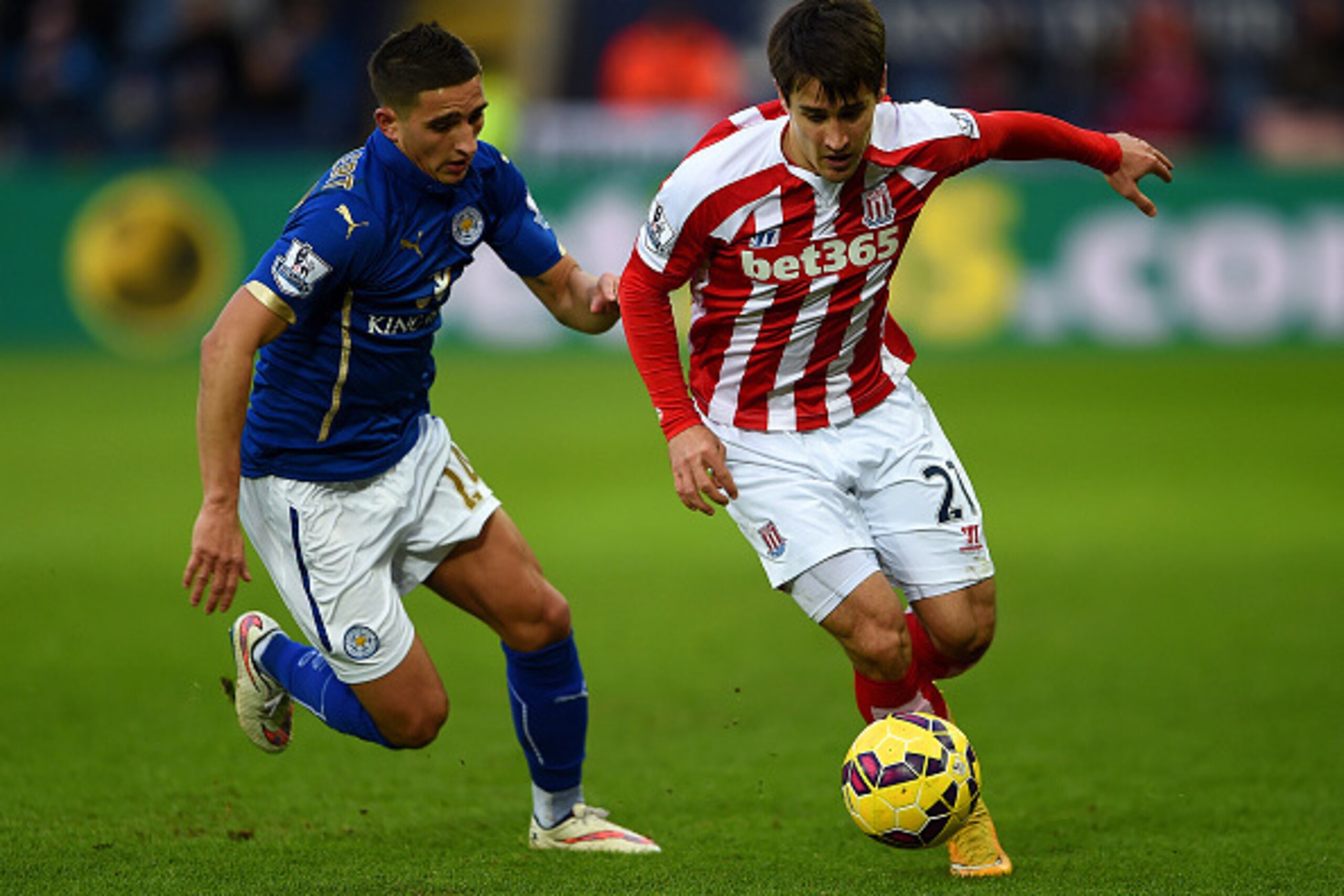 LEICESTER, ENGLAND - JANUARY 17:  Bojan Krkic of Stoke City battles for the ball with Anthony Knockaert of Leicester City during the Barclays Premier League match between Leicester City and Stoke City at The King Power Stadium on January 17, 2015 in Leice
