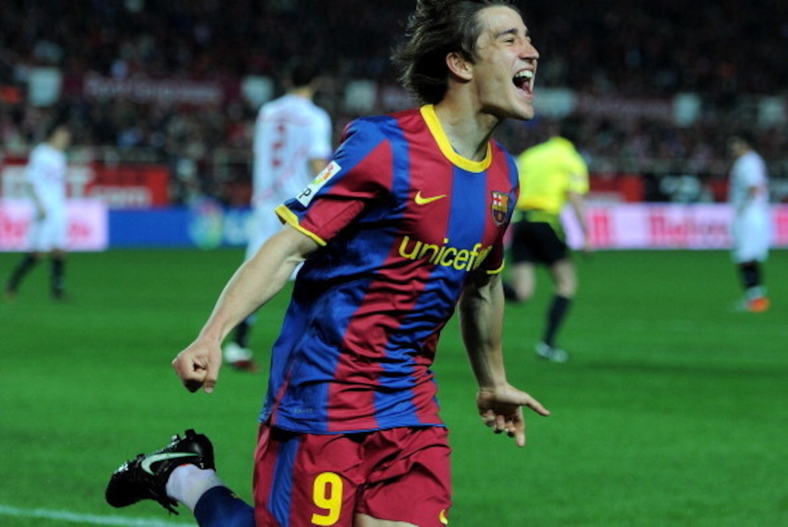 SEVILLE, SPAIN - MARCH 13:  Bojan Krkic of Barcelona celebrates scoring his sides opening goal during the la Liga match between Sevilla and Barcelona at Estadio Ramon Sanchez Pizjuan on March 13, 2011 in Seville, Spain.  (Photo by Jasper Juinen/Getty Imag