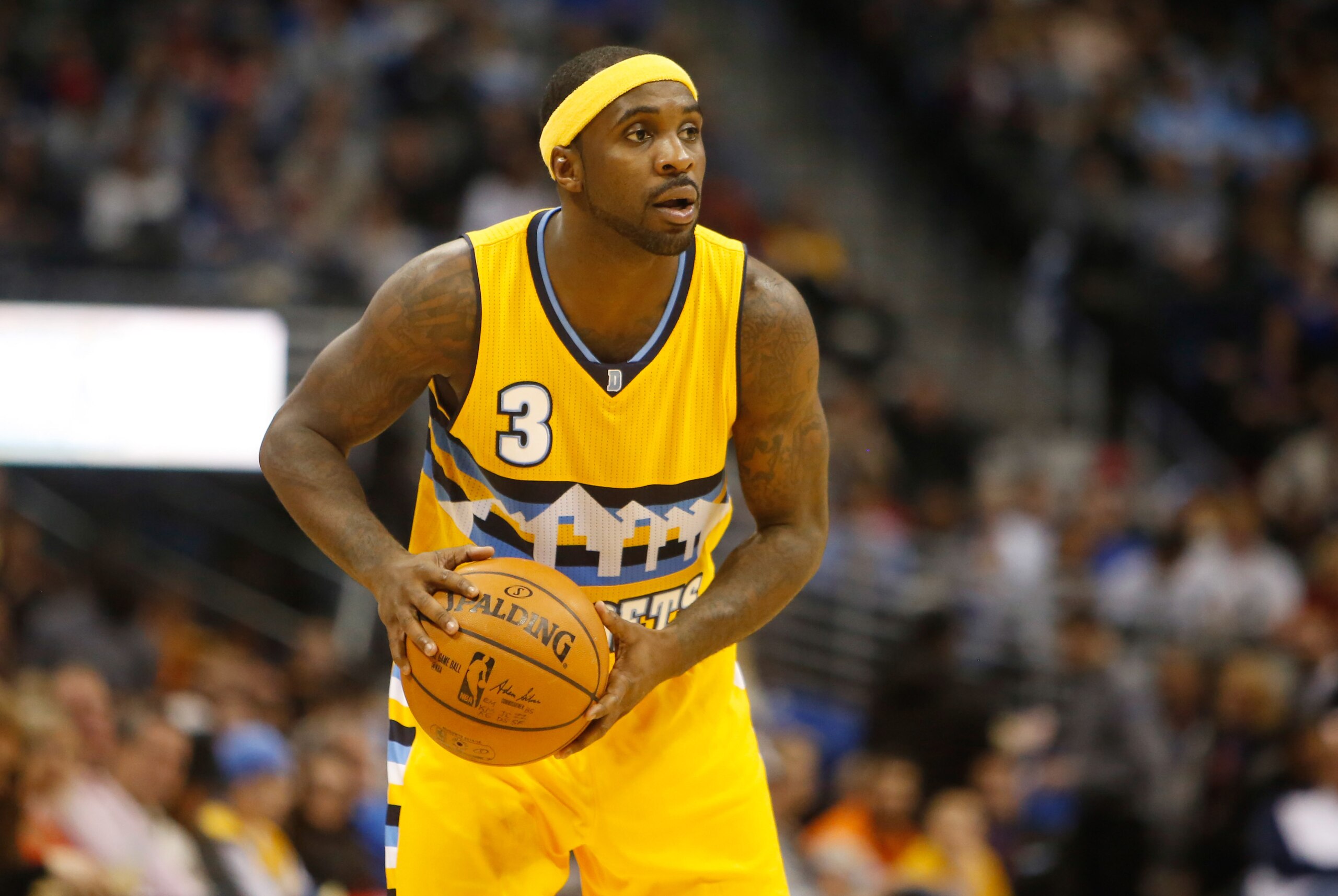 Jan 3, 2015; Denver, CO, USA; Denver Nuggets guard Ty Lawson (3) during the game against the Memphis Grizzlies at Pepsi Center. Mandatory Credit: Chris Humphreys-USA TODAY Sports