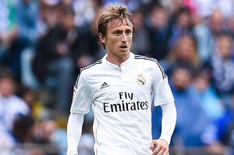 LA CORUNA, SPAIN - SEPTEMBER 20:  Luka Modric of Real Madrid CF runs with the ball during the La Liga match between RC Deportivo La Coruna and Real Madrid CF at Riazor Stadium on September 20, 2014 in La Coruna, Spain.  (Photo by David Ramos/Getty Images)