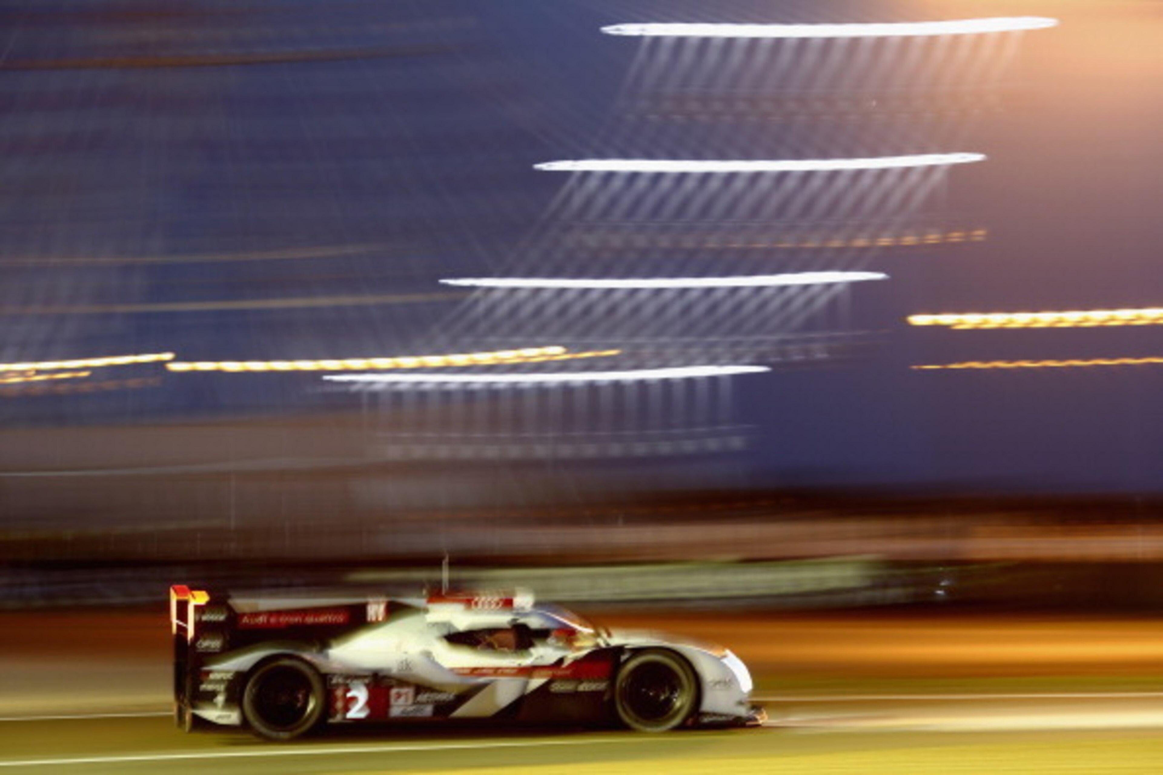 LE MANS, FRANCE - JUNE 11:  Audi Sport Team Joest, Audi R18 E-Tron Quattro of Marcel Fassler, André Lotterer, Benoit Treluyer during qualifying on June 11, 2014 in Le Mans, France.  (Photo by Andrew Hone/Getty Images)