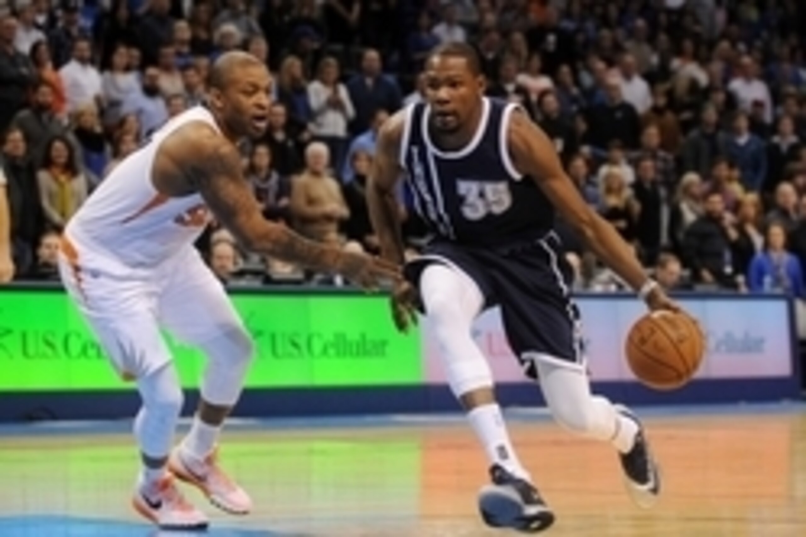 Dec 31, 2014; Oklahoma City, OK, USA;  Oklahoma City Thunder forward Kevin Durant (35) drives to the basket against Phoenix Suns forward P.J. Tucker (17) during the first quarter at Chesapeake Energy Arena. Mandatory Credit: Mark D. Smith-USA TODAY Sports
