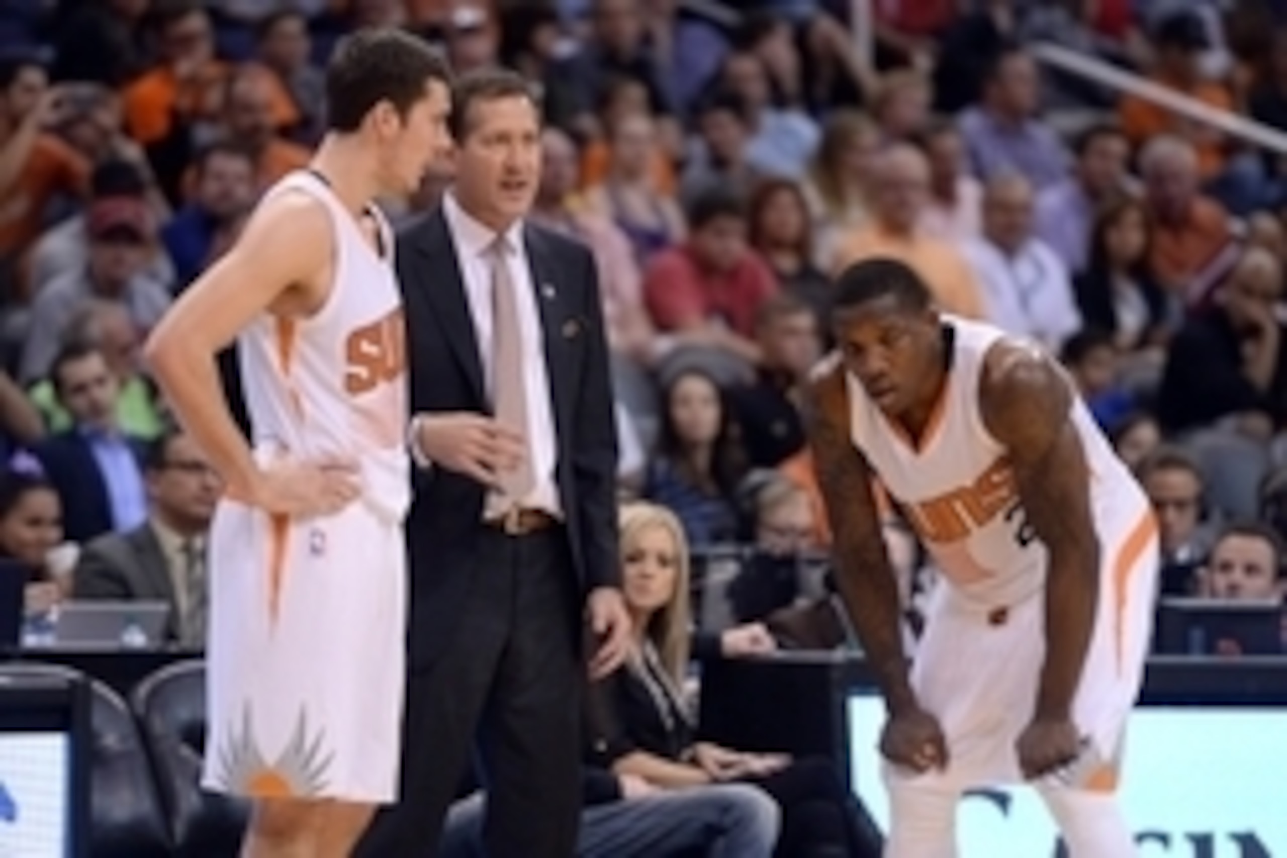 Nov 9, 2014; Phoenix, AZ, USA; Phoenix Suns head coach Jeff Hornacek talks with Phoenix Suns guard Goran Dragic (1) and Phoenix Suns guard Eric Bledsoe (2) during the second half at US Airways Center. The Suns won 107-95. Mandatory Credit: Joe Camporeale-