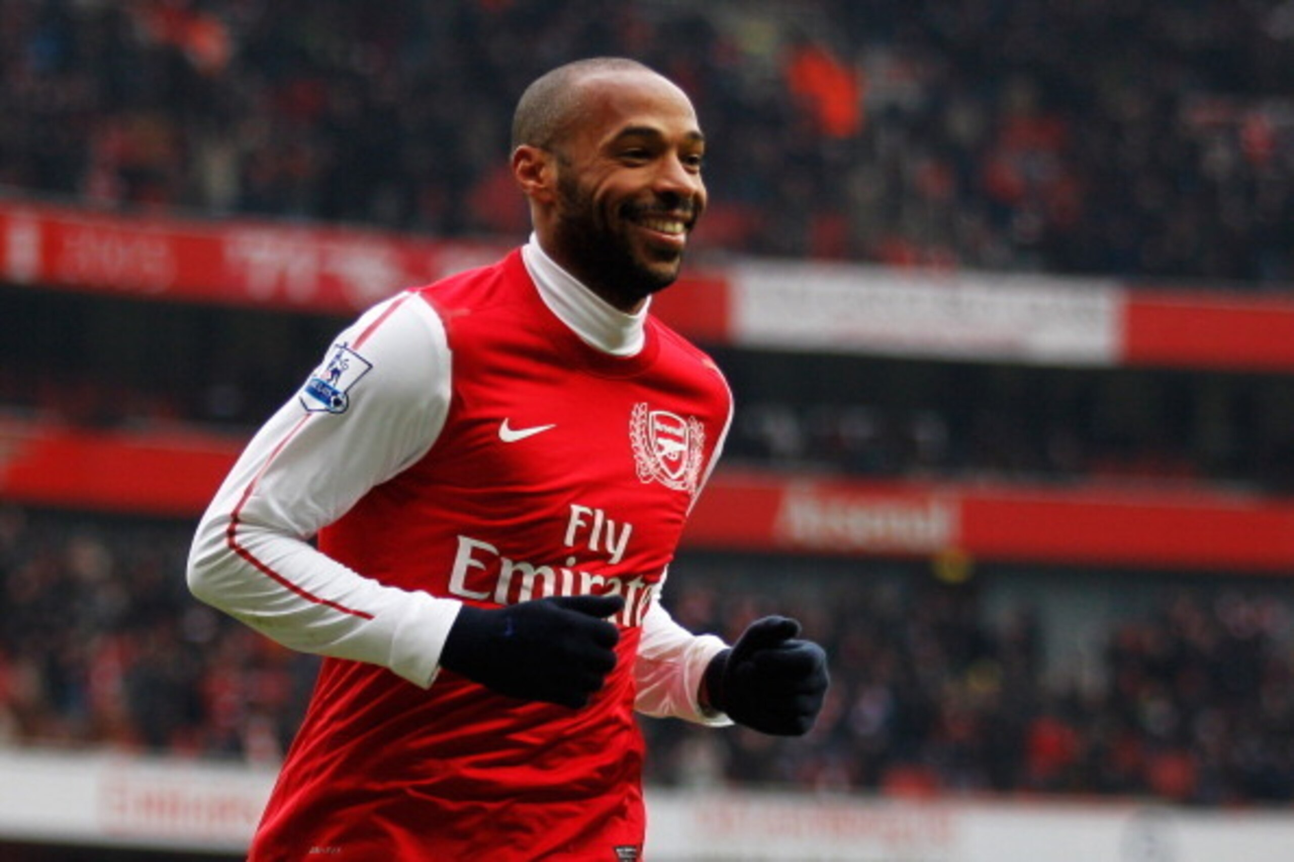 LONDON, ENGLAND - FEBRUARY 04:  Thierry Henry of Arsenal celebrates after scoring Arsenal's seventh goal of the match during the Barclays Premier League match between Arsenal and Blackburn Rovers at Emirates Stadium on February 4, 2012 in London, England.