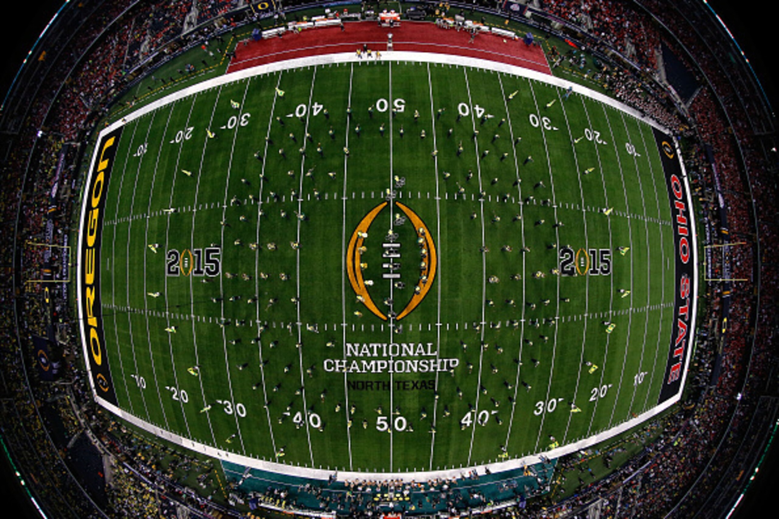 ARLINGTON, TX - JANUARY 12:  The Oregon Ducks marching band performs prior to the College Football Playoff National Championship Game against the Ohio State Buckeyes at AT&T Stadium on January 12, 2015 in Arlington, Texas.  (Photo by Tom Pennington/Getty 