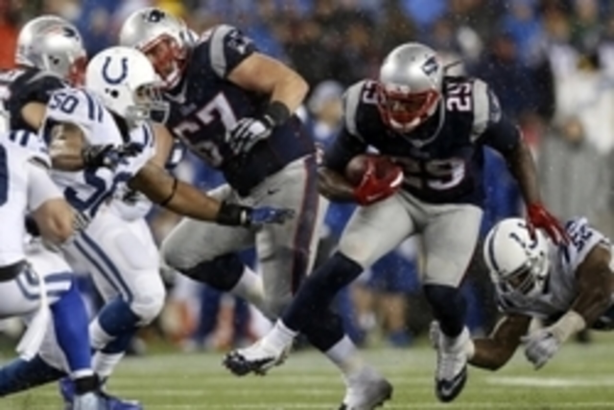 Jan 18, 2015; Foxborough, MA, USA; New England Patriots running back LeGarrette Blount (29) runs the ball against Indianapolis Colts inside linebacker Jerrell Freeman (50) during the fourth quarter in the AFC Championship Game at Gillette Stadium. Mandato Jan 18, 2015; Foxborough, MA, USA; New England Patriots running back LeGarrette Blount (29) runs the ball against Indianapolis Colts inside linebacker Jerrell Freeman (50) during the fourth quarter in the AFC Championship Game at Gillette Stadium. Mandato