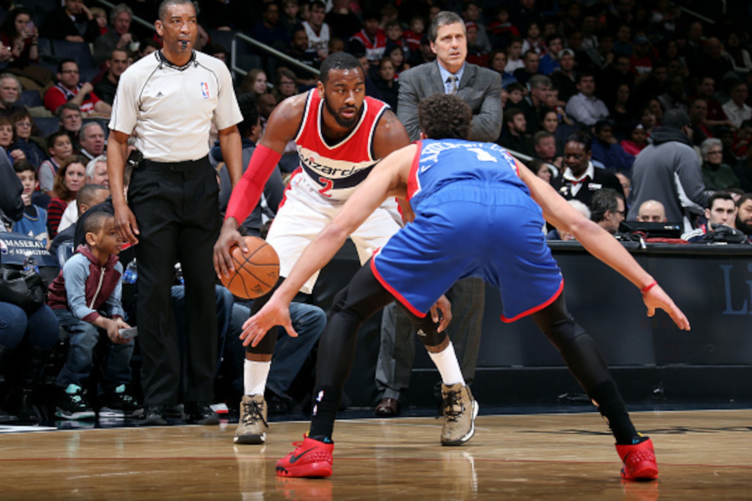 WASHINGTON, DC -  JANUARY 19: John Wall #2 of the Washington Wizards handles the ball against the Philadelphia 76ers on January 19, 2015 at Verizon Center in Washington, DC. NOTE TO USER: User expressly acknowledges and agrees that, by downloading and or 
