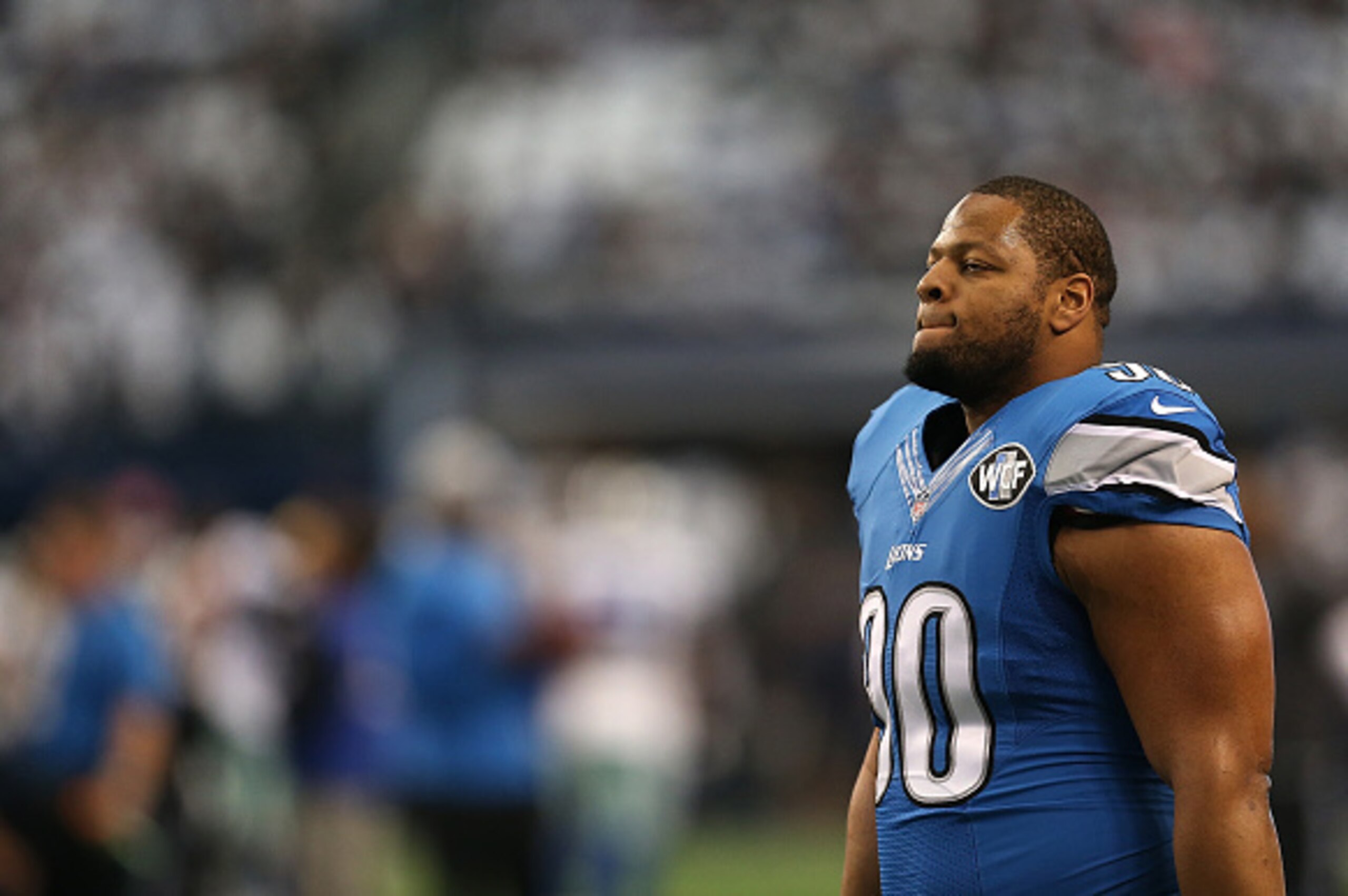 ARLINGTON, TX - JANUARY 04: Ndamukong Suh #90 of the Detroit Lions looks on before a NFC Wild Card Playoff game against the Dallas Cowboys at AT&T Stadium on January 4, 2015 in Arlington, Texas. (Photo by Sarah Glenn/Getty Images) ARLINGTON, TX - JANUARY 04: Ndamukong Suh #90 of the Detroit Lions looks on before a NFC Wild Card Playoff game against the Dallas Cowboys at AT&T Stadium on January 4, 2015 in Arlington, Texas. (Photo by Sarah Glenn/Getty Images)