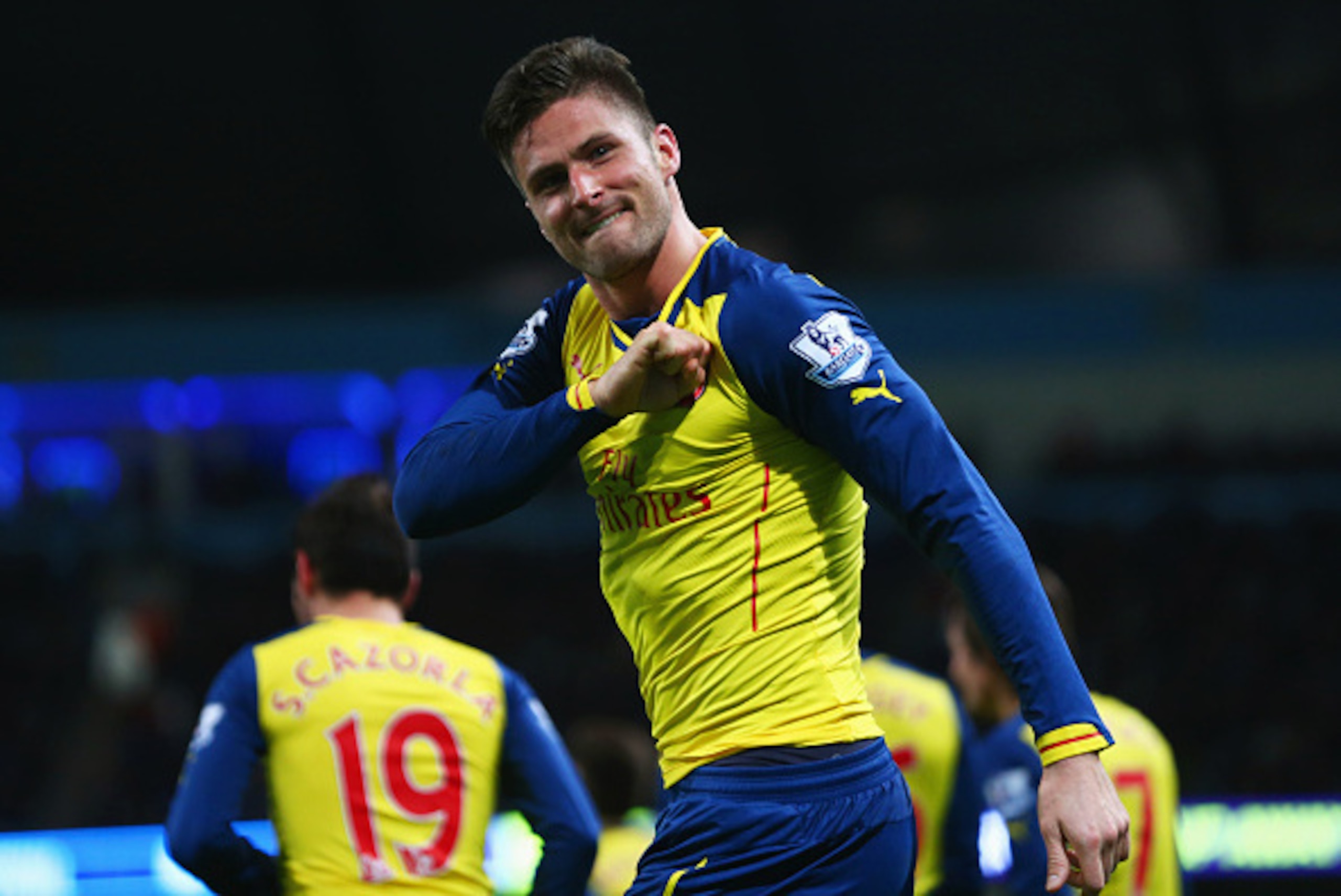 MANCHESTER, ENGLAND - JANUARY 18:  Olivier Giroud of Arsenal (12) celebrates as he scores their second goal during the Barclays Premier League match between Manchester City and Arsenal at Etihad Stadium on January 18, 2015 in Manchester, England.  (Photo 