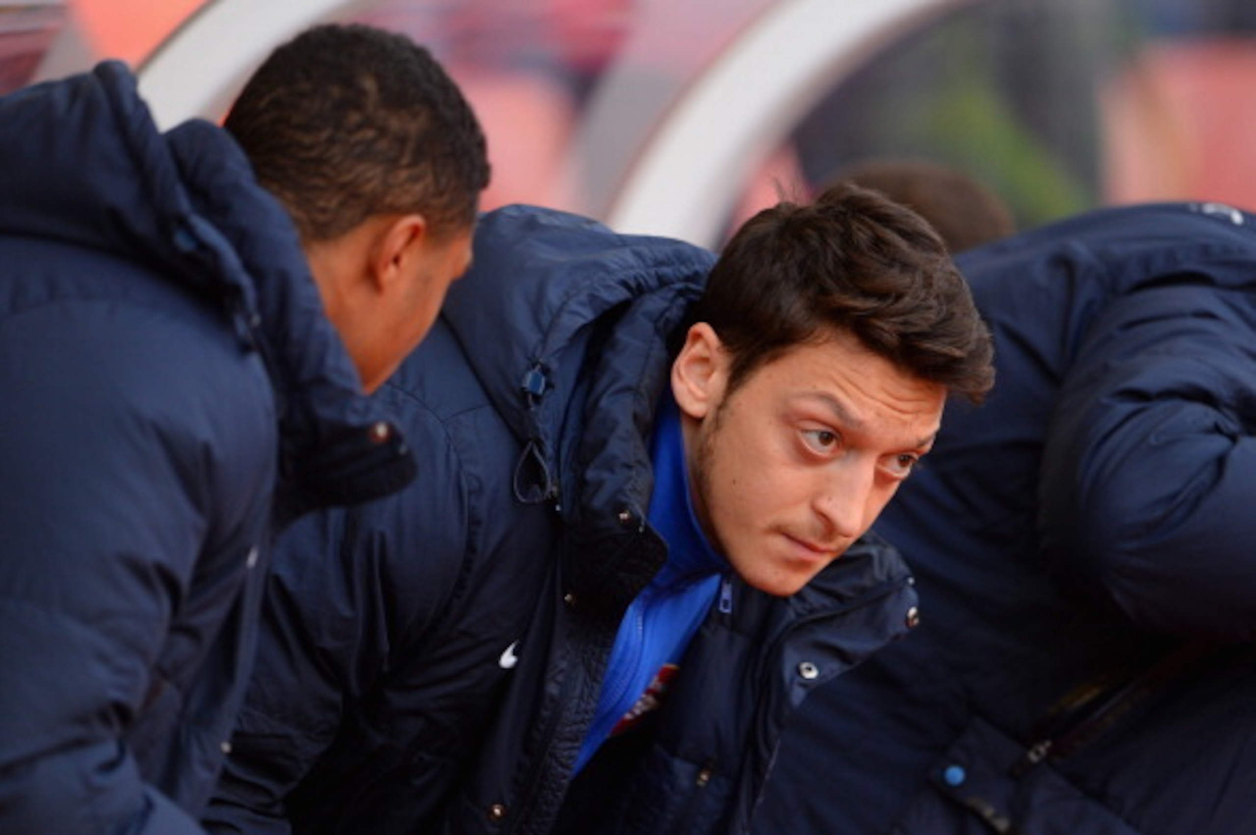 STOKE ON TRENT, ENGLAND - MARCH 01:  Mesut Ozil of Arsenal takes his seat on the bench prior to the Barclays Pemier League match between Stoke City and Arsenal at the Britannia Stadium on March 1, 2014 in Stoke on Trent, England.  (Photo by Michael Regan/