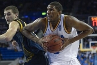 Jan 11, 2015; Los Angeles, CA, USA; UCLA Bruins forward Kevon Looney (5) drives to the basket past California Golden Bears forward David Kravish (45) during the second half at Pauley Pavilion. Mandatory Credit: Robert Hanashiro-USA TODAY Sports