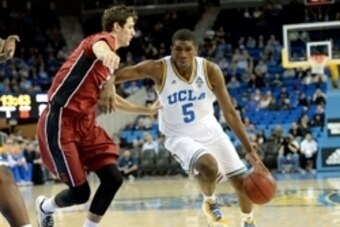 Jan 8, 2015; Los Angeles, CA, USA;  Stanford Cardinal forward Rosco Allen (25) defends UCLA Bruins forward Kevon Looney (5) in the first half of the game at Pauley Pavilion. Mandatory Credit: Jayne Kamin-Oncea-USA TODAY Sports
