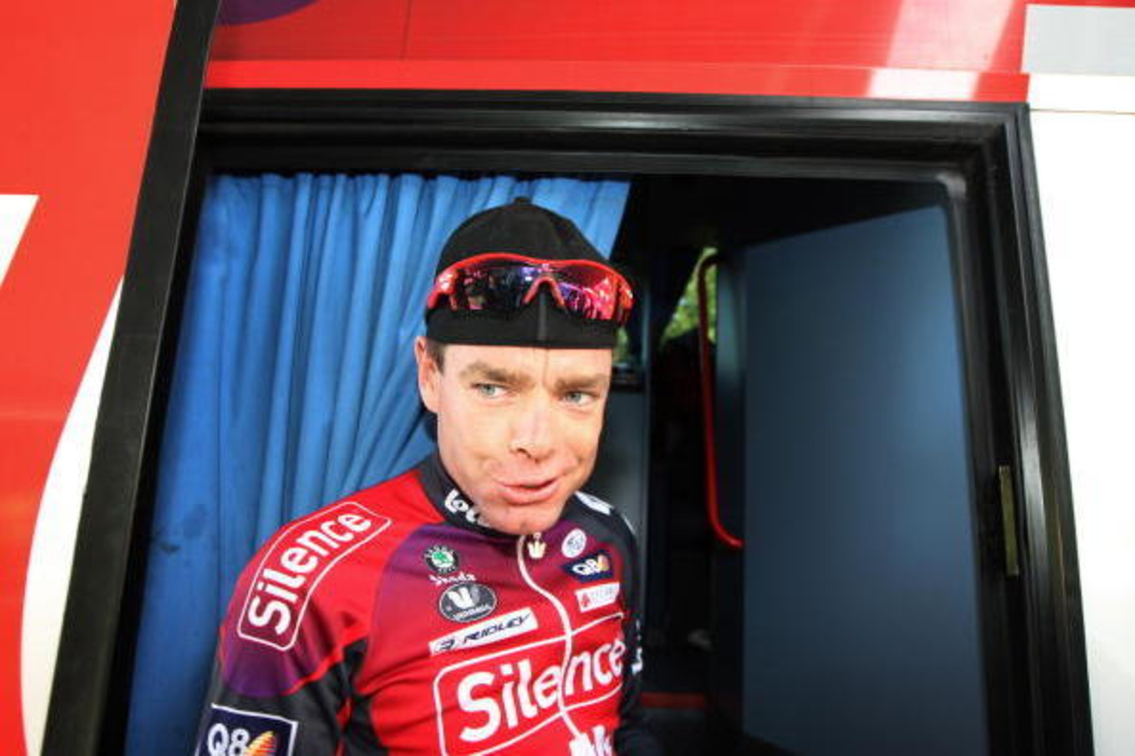 PIANFEI, ITALY - JULY 21:  Cadel Evans of Australia and team Silence-Lotto stands in the door opening of the team bus prior to a training on the second rest day of the 2008 Tour de France on July 21, 2008 in Pianfei, Italy. Evans stands third in the overa