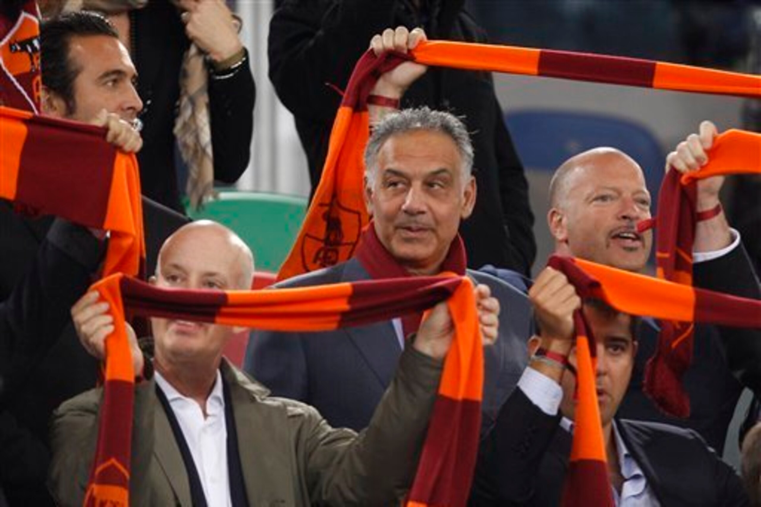 Roma owner James Pallotta (centre) Roma owner James Pallotta (centre)