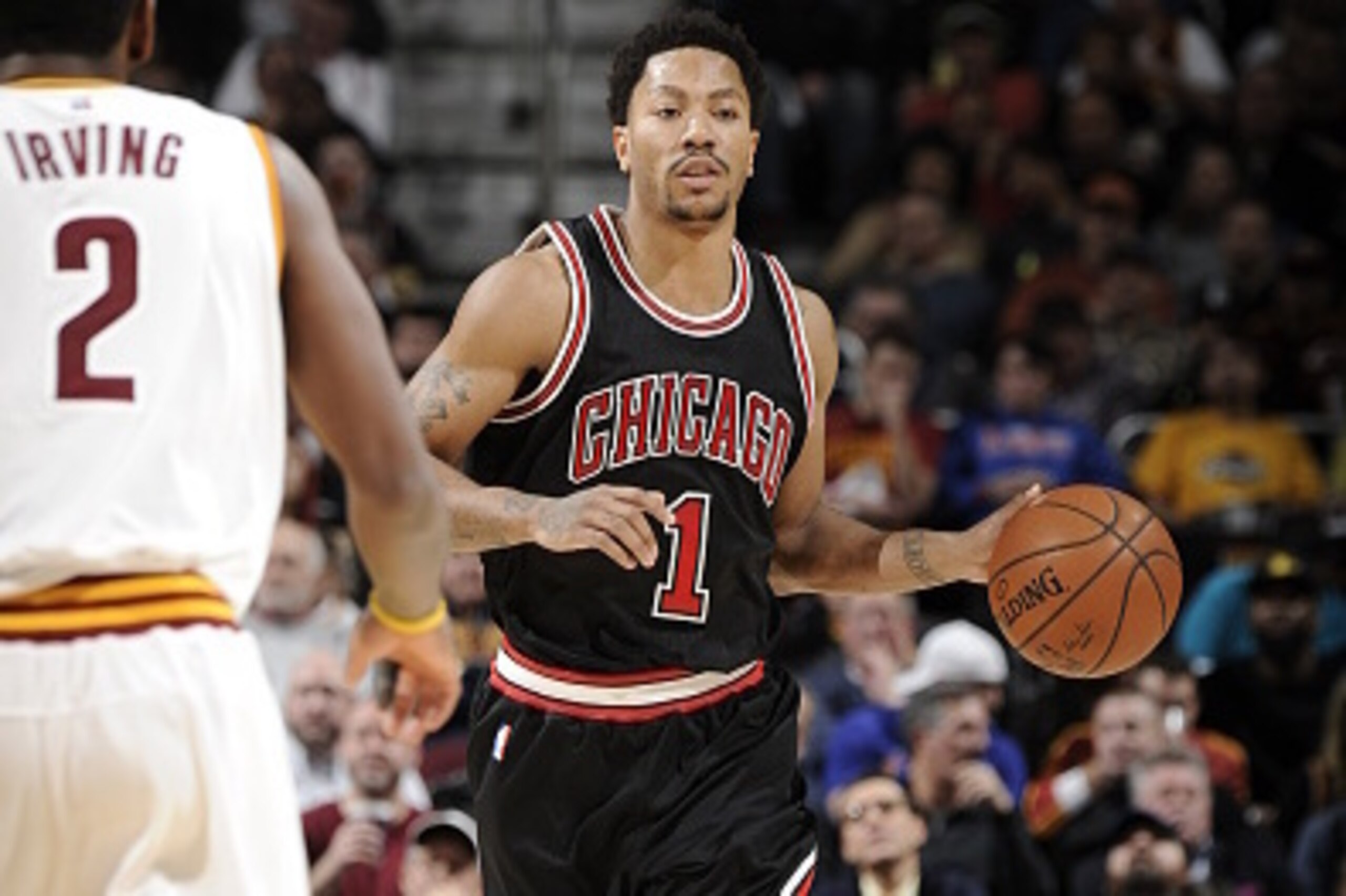 CLEVELAND, OH - JANUARY 19:  Derrick Rose #1 of the Chicago Bulls brings the ball up court against the Cleveland Cavaliers on January 19, 2015 at The Quicken Loans Arena in Cleveland, Ohio. NOTE TO USER: User expressly acknowledges and agrees that, by dow