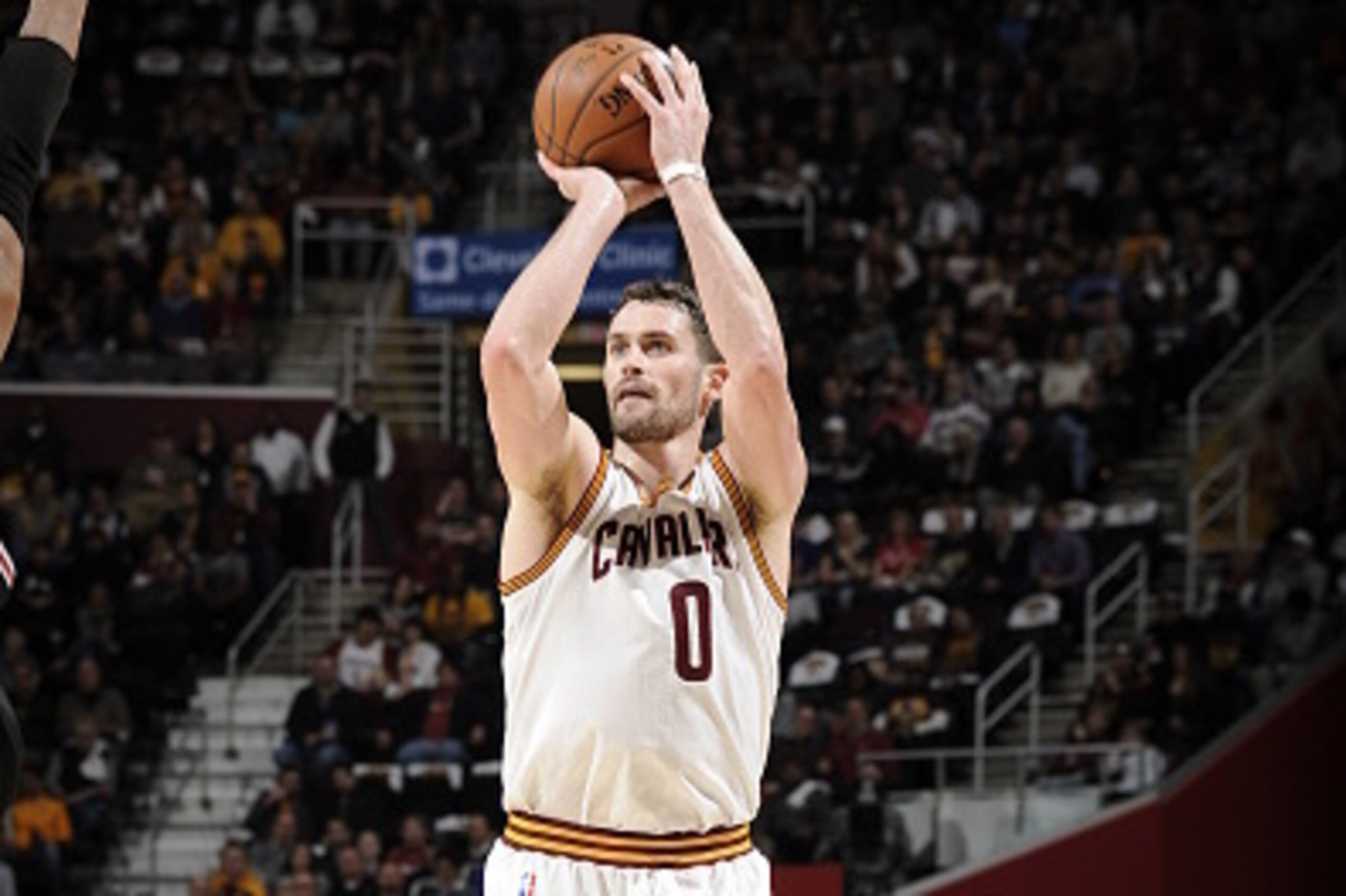 CLEVELAND, OH - JANUARY 19:  Kevin Love #0 of the Cleveland Cavaliers shoots against the Chicago Bulls on January 19, 2015 at The Quicken Loans Arena in Cleveland, Ohio. NOTE TO USER: User expressly acknowledges and agrees that, by downloading and or usin