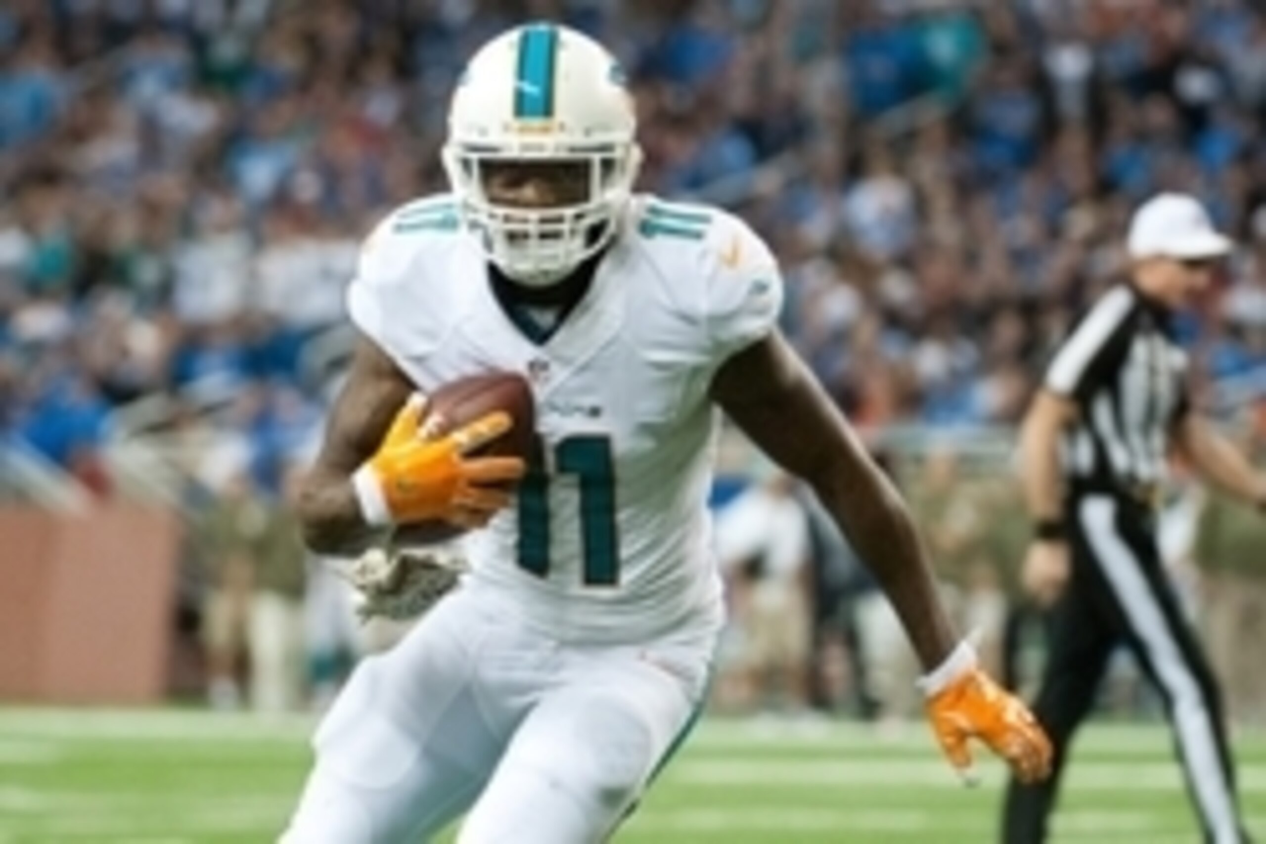 Nov 9, 2014; Detroit, MI, USA; Miami Dolphins wide receiver Mike Wallace (11) runs to scores touchdown during the third quarter against the Detroit Lions at Ford Field. Detroit won 20-16. Mandatory Credit: Tim Fuller-USA TODAY Sports Nov 9, 2014; Detroit, MI, USA; Miami Dolphins wide receiver Mike Wallace (11) runs to scores touchdown during the third quarter against the Detroit Lions at Ford Field. Detroit won 20-16. Mandatory Credit: Tim Fuller-USA TODAY Sports