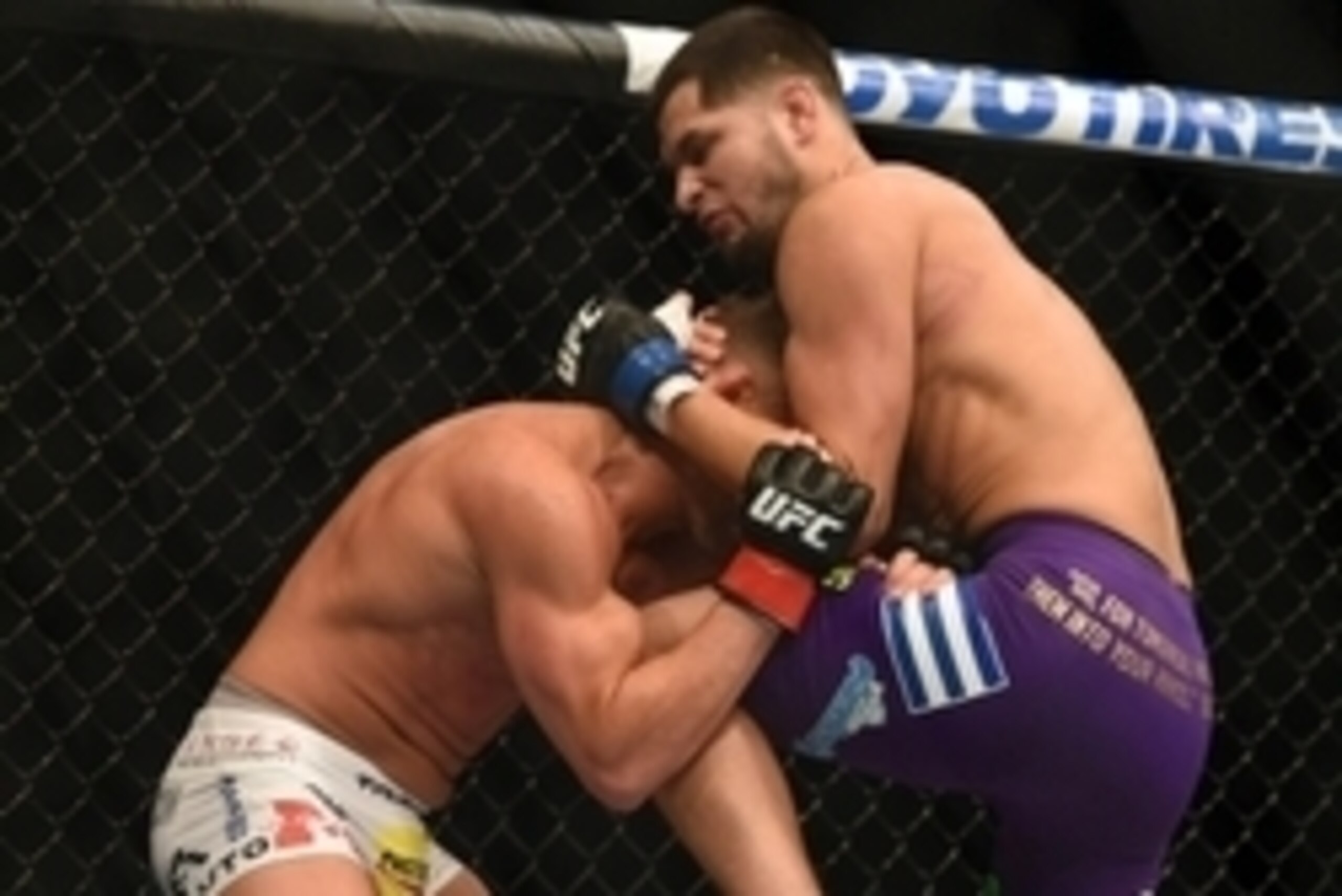 July 26, 2014; San Jose, CA, USA; Daron Cruickshank (red gloves) defends against Jorge Masvidal (blue gloves) during the lightweight bout of the FOX UFC Saturday at SAP Center. Mandatory Credit: Kyle Terada-USA TODAY Sports