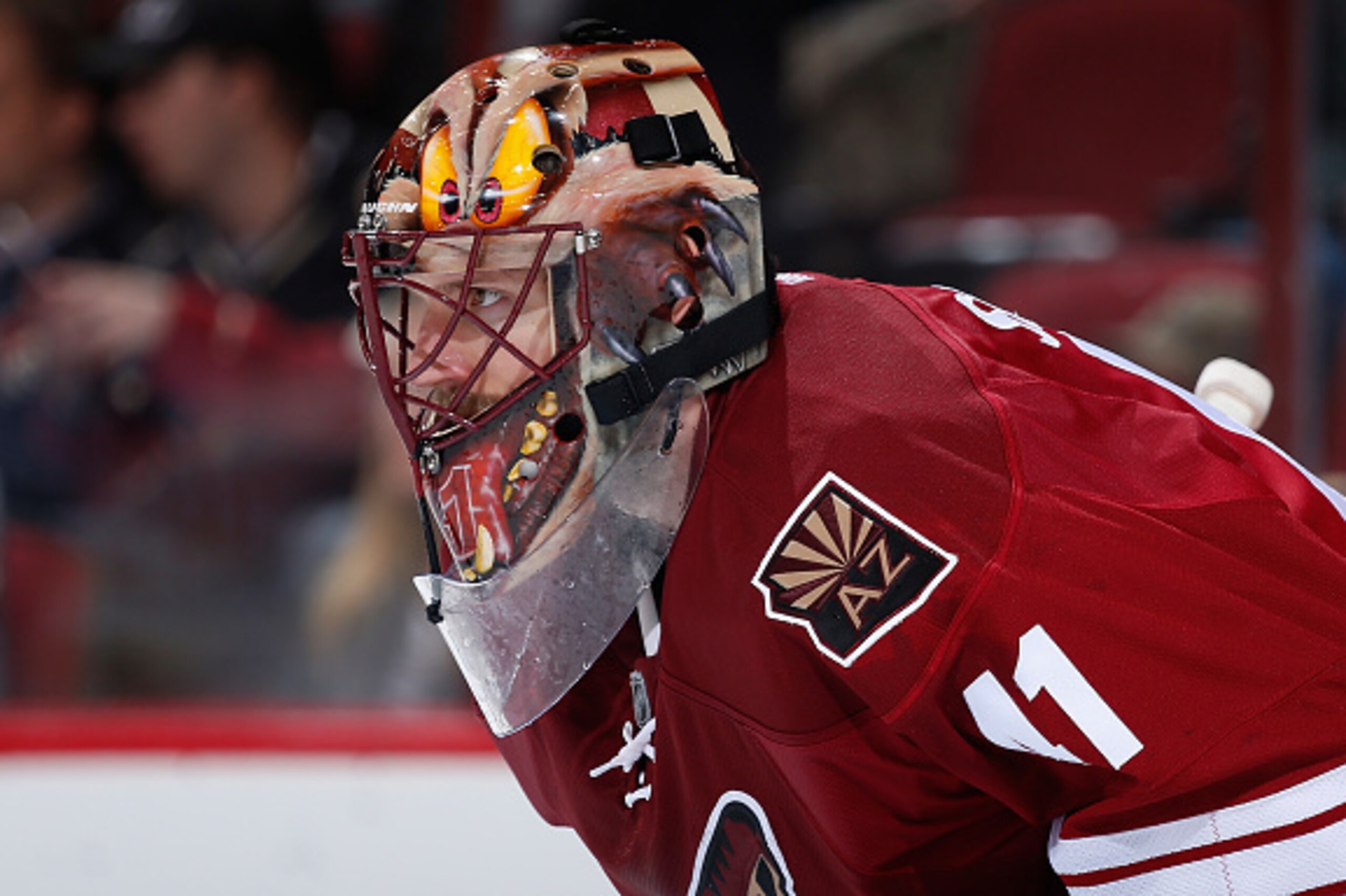 GLENDALE, AZ - JANUARY 15:  Goaltender Mike Smith #41 of the Arizona Coyotes looks down ice during the second period of the NHL game against the Calgary Flames at Gila River Arena on January 15, 2015 in Glendale, Arizona.  (Photo by Christian Petersen/Get
