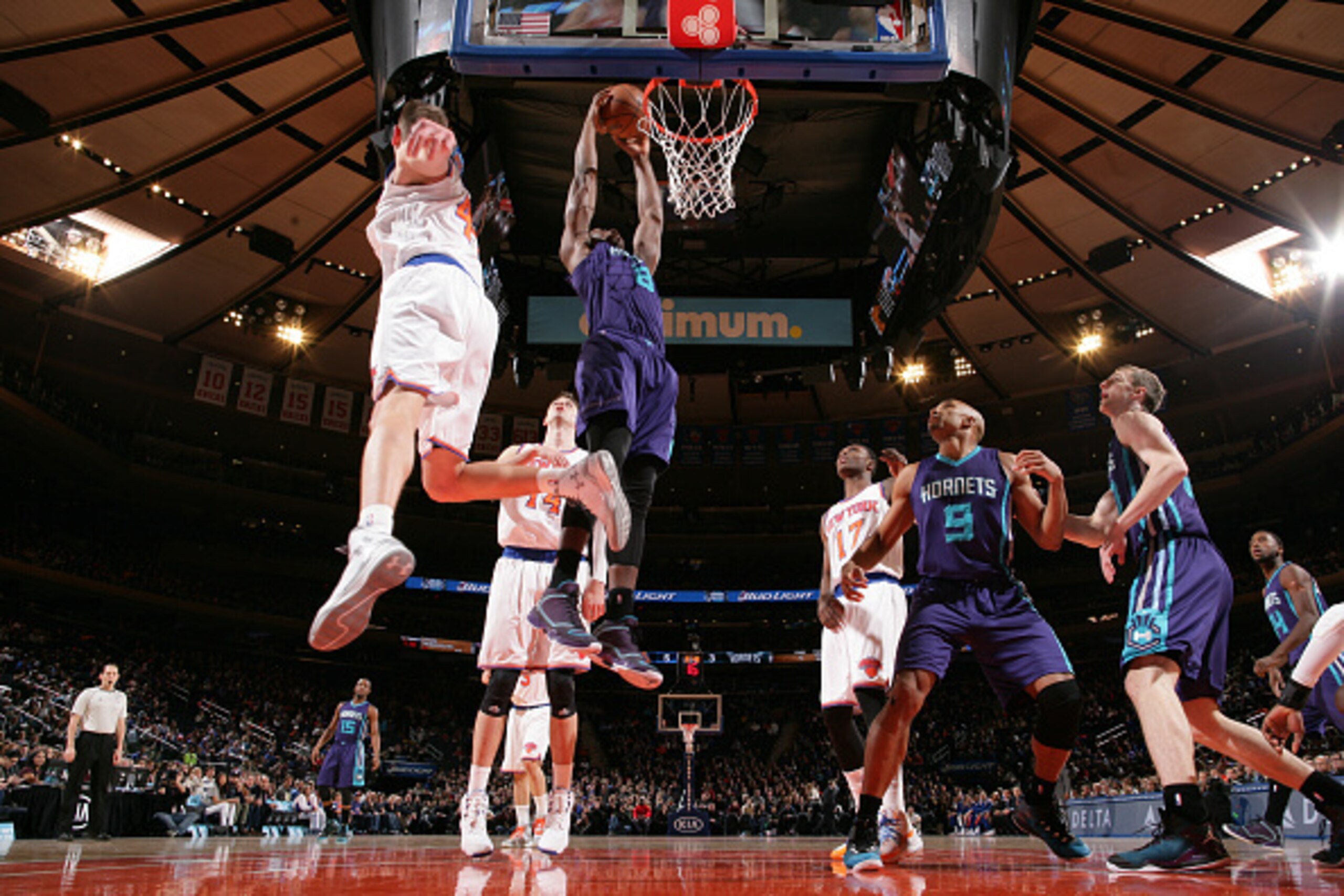 NEW YORK, NY - JANUARY 10: Bismack Biyombo #8 of the Charlotte Hornets goes up for a dunk against the New York Knicks during the game on January 10, 2015 at Madison Square Garden in New York City, New York. NOTE TO USER: User expressly acknowledges and NEW YORK, NY - JANUARY 10: Bismack Biyombo #8 of the Charlotte Hornets goes up for a dunk against the New York Knicks during the game on January 10, 2015 at Madison Square Garden in New York City, New York. NOTE TO USER: User expressly acknowledges and