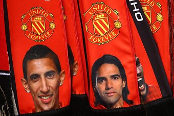 MANCHESTER, ENGLAND - NOVEMBER 08:  Detail of scarves showing Angel Di Maria and Radamel Falcao of Manchester United prior to the Barclays Premier League match between Manchester United and Crystal Palace at Old Trafford on November 8, 2014 in Manchester,