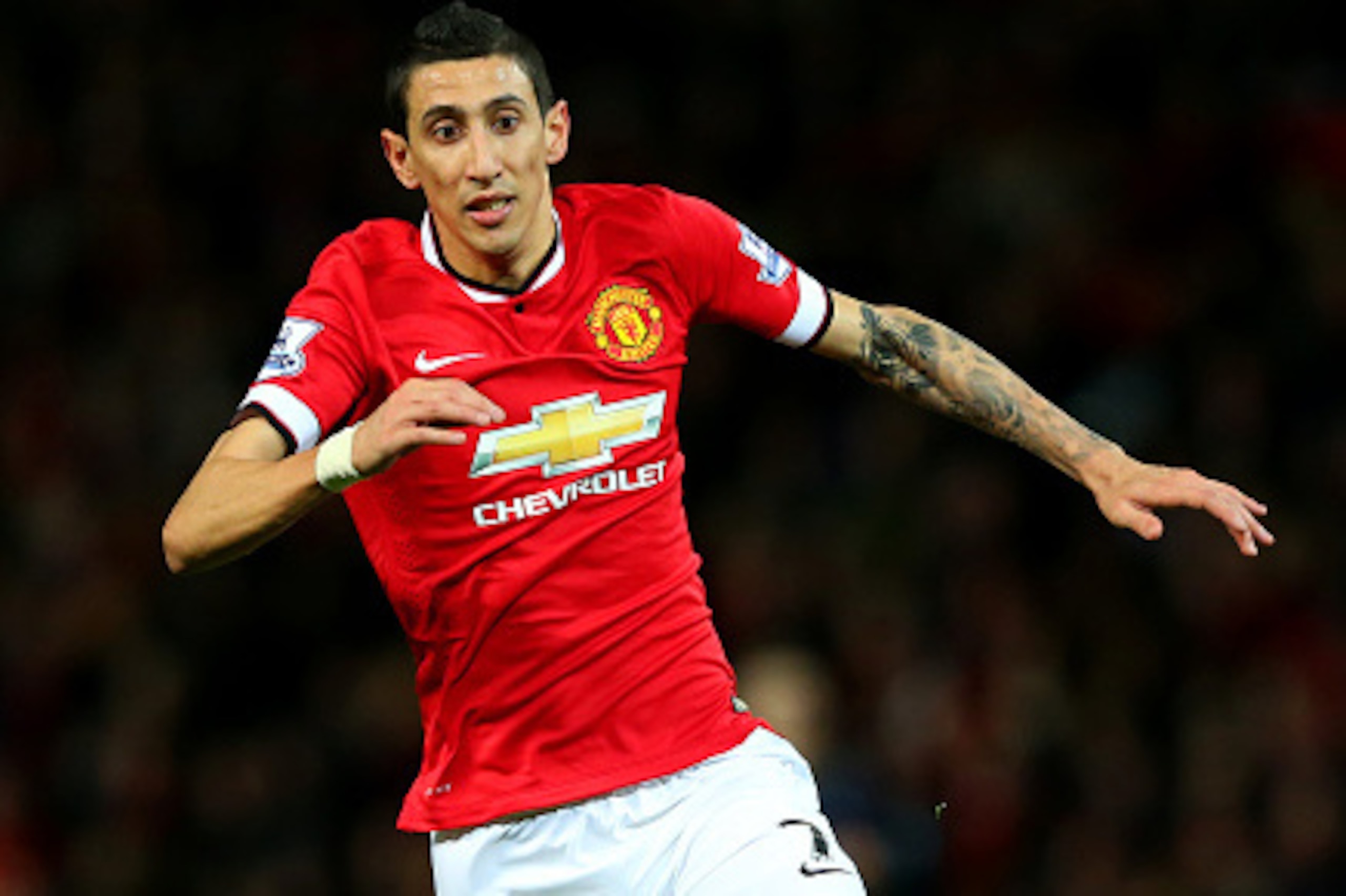 MANCHESTER, ENGLAND - JANUARY 11:  Angel di Maria of Manchester United runs with the ball during the Barclays Premier League match between Manchester United and Southampton at Old Trafford on January 11, 2015 in Manchester, England.  (Photo by Alex Livese