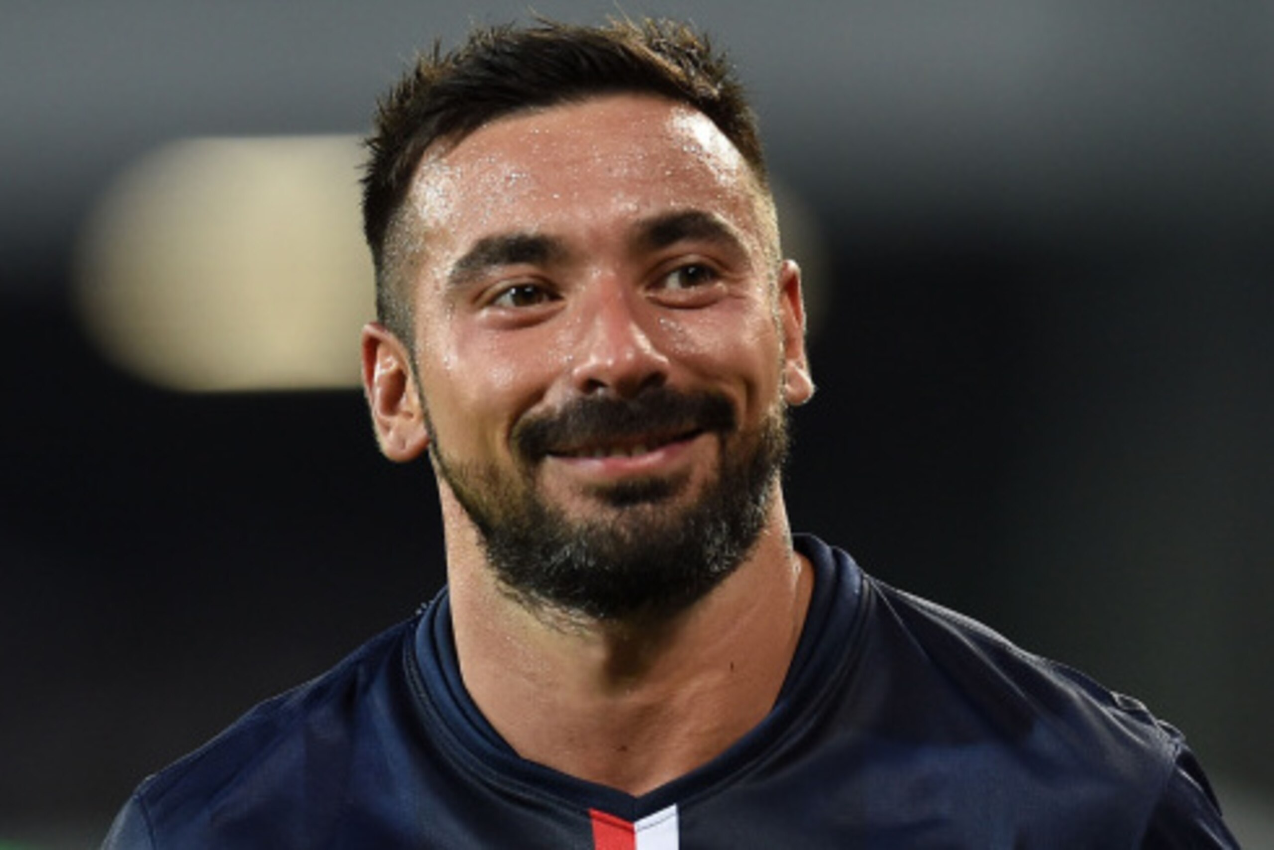 NAPLES, ITALY - AUGUST 11:  Ezequiel Lavezzi  of Paris Saint Germain smiles after the pre-season friendly match between SSC Napoli and Paris Saint-Germain FC at Stadio San Paolo on August 11, 2014 in Naples, Italy.  (Photo by Giuseppe Bellini/Getty Images